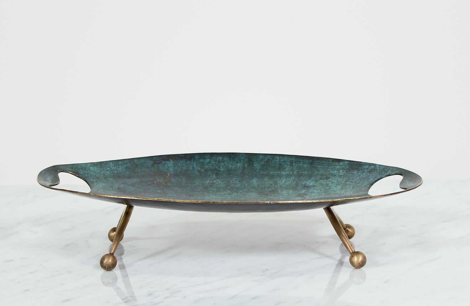 Mid-Century tray designed by Maurice Ascalon for Pal-Bell Co. in Israel circa 1950’s. This stunning tray features Ascalons’ signature verdigris patina and sits tall on four decorative legs comprised of bronze. This beautiful collectors item
