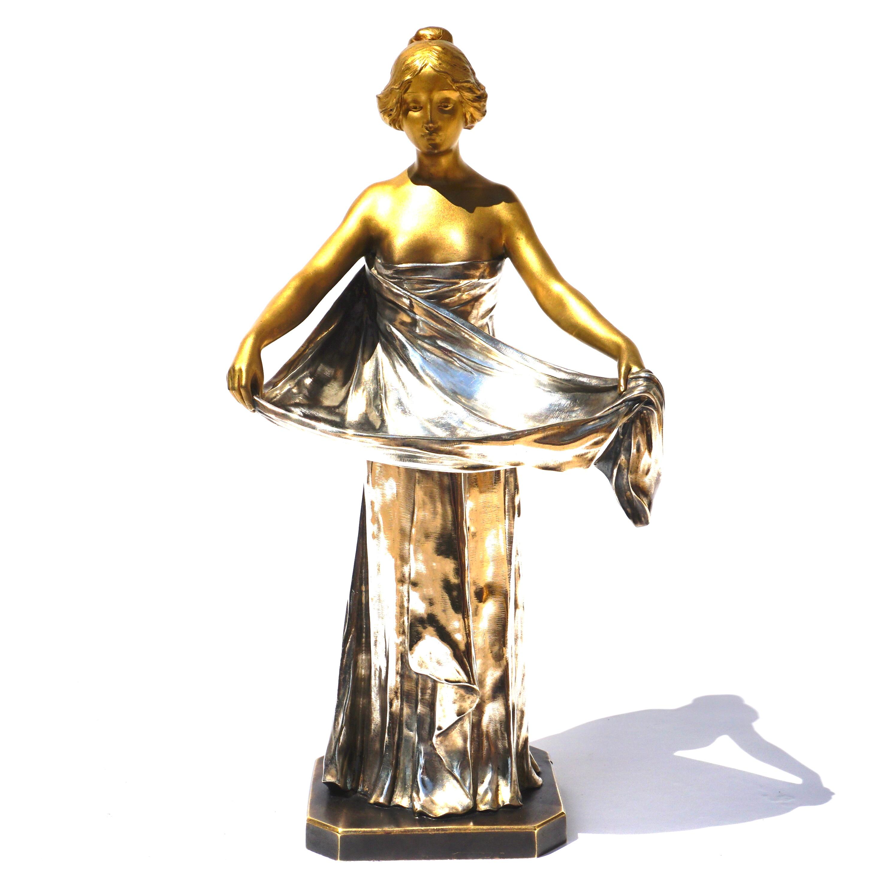 Maurice Bouval

French Art Nouveau Gilt and Silvered Bronze Figural Vide Poche
Cast from a model by Maurice Bouval, cast by Jollet & Cie., Paris, circa 1900
Modeled as a maiden in a standing pose lifting the upper end of her garment to form a