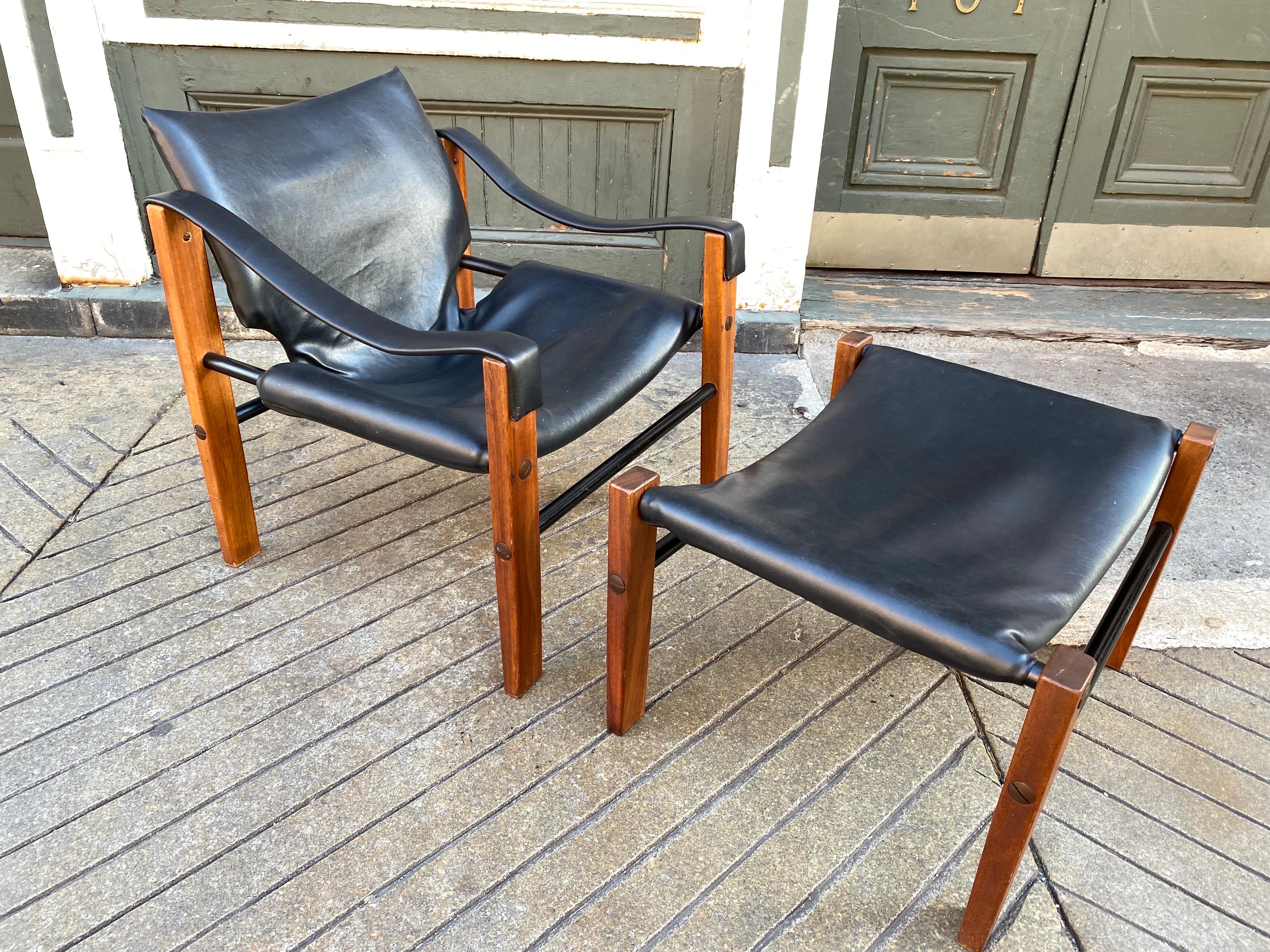 Maurice Burkedesigned Arkana chair and ottoman. Never seen with the ottoman before! Super comfortable and easy to move around any space! Solid Teak Legs with metal tubular runners. Each end capped off with an oversized Brass Screw. Original vinyl in