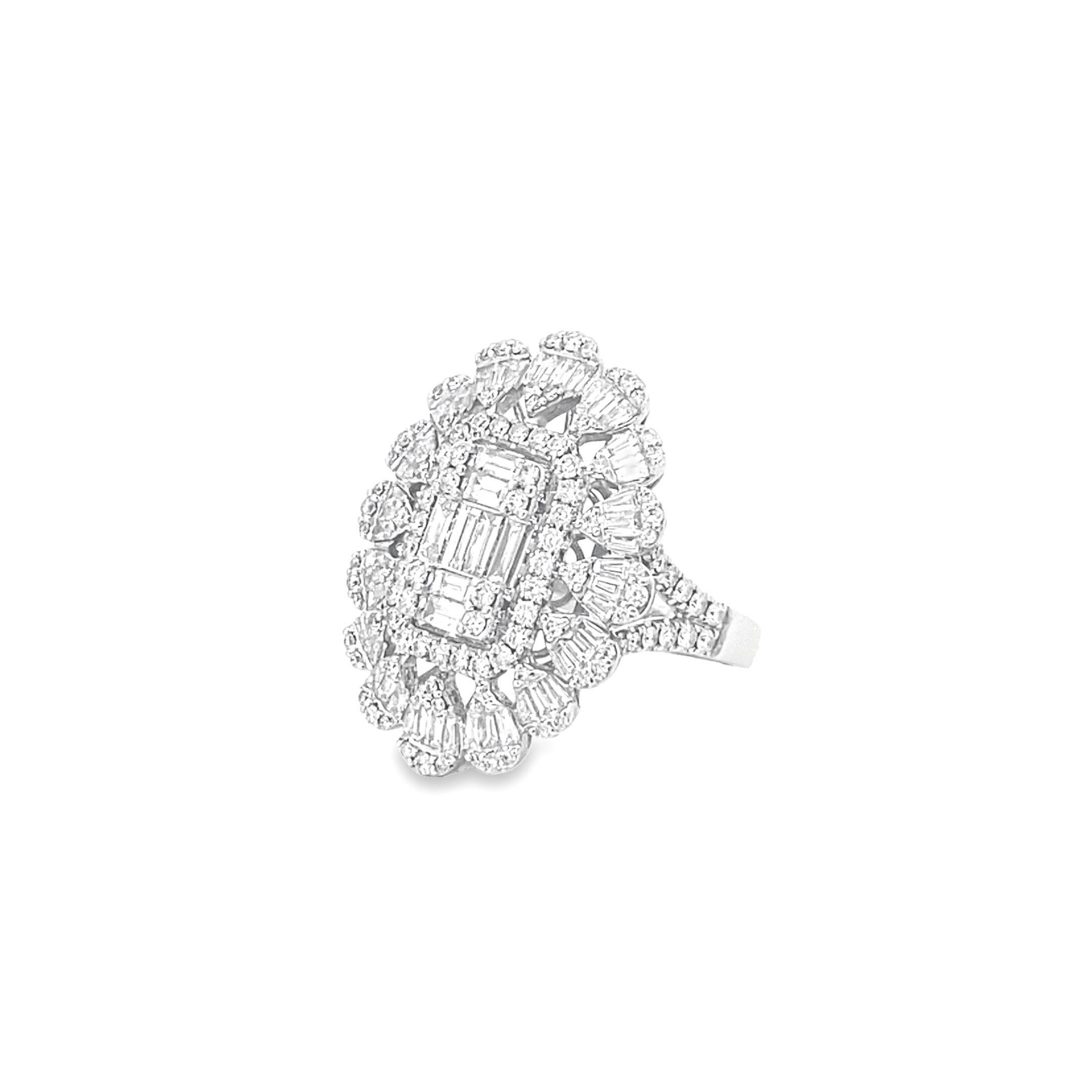 This stunning mosaic-style ring features a luxurious 18k white gold setting adorned with a dazzling array of multi-shape diamonds totaling 2.49 carats. The prong-set diamonds are expertly placed to create a visually captivating mosaic pattern,