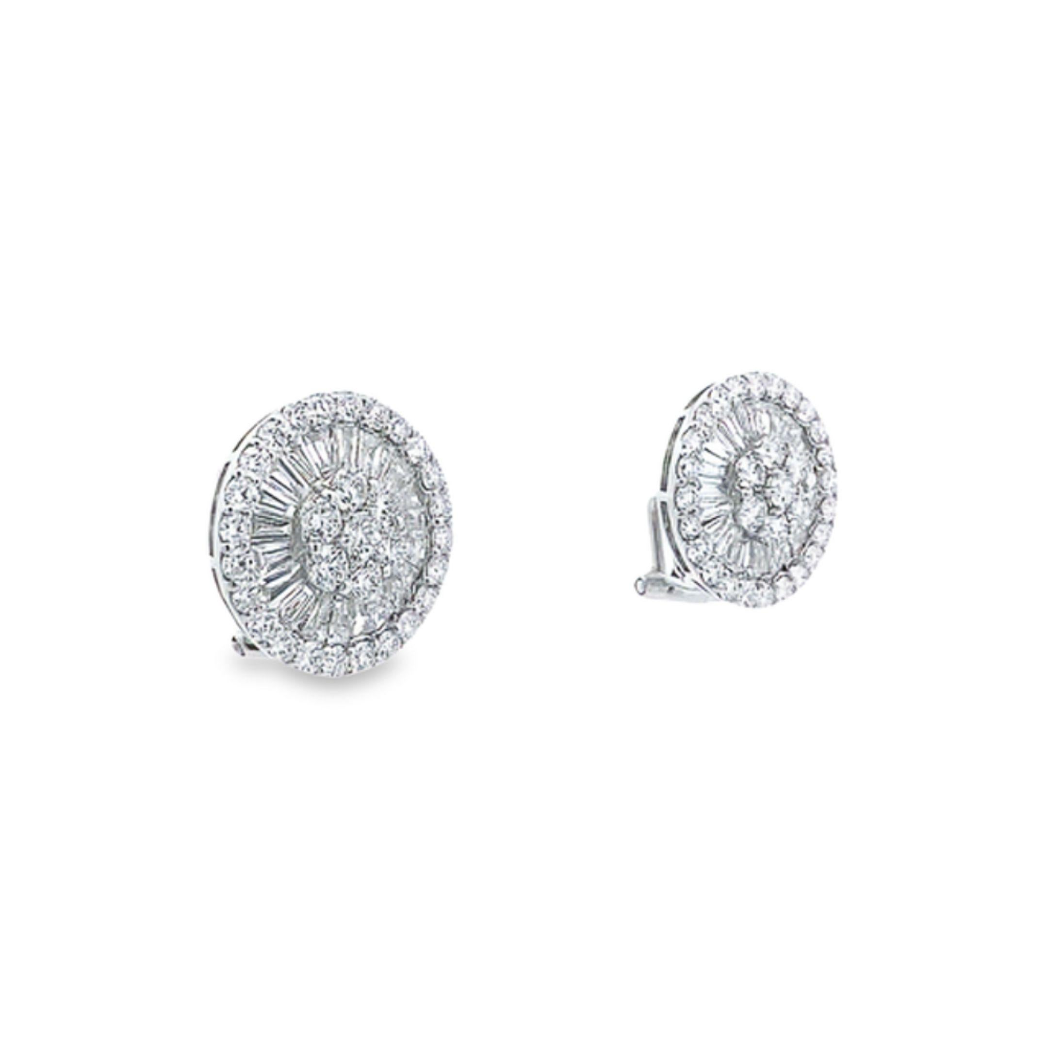 These elegant earrings feature a radiant buttercup design, showcasing 2.29 carats of round white diamonds and 1.6 carats of baguette diamonds, all meticulously prong-set in 18k white gold. The intricate arrangement creates a brilliant,