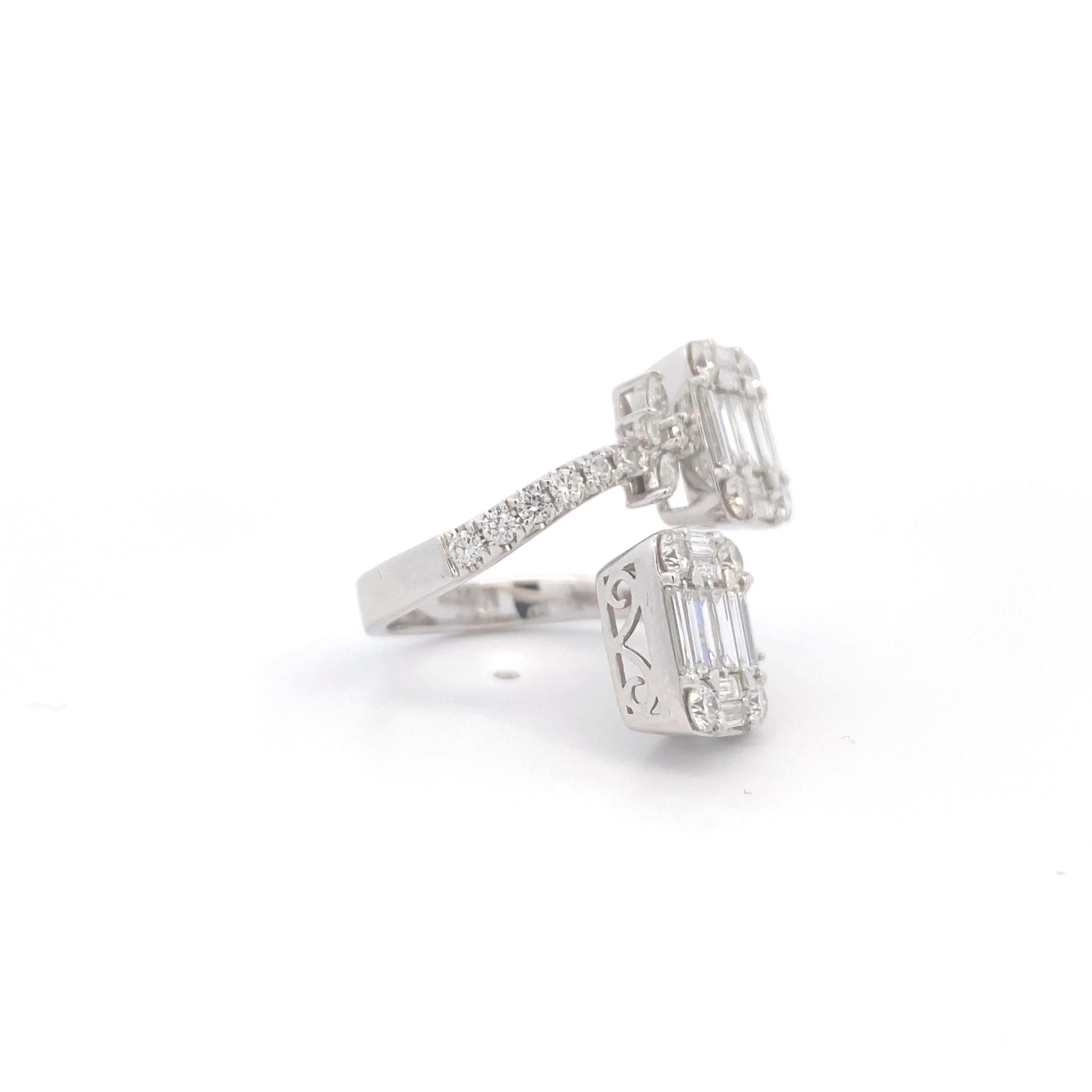 This exquisite modern ring showcases a stunning mosaic-style design, crafted with elegance in mind. The 18k white gold band is adorned with a breathtaking combination of white baguette diamonds totaling 1.48 carats, white round diamonds totaling