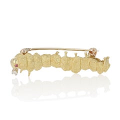 Maurice Guyot Diamond and Ruby Caterpillar Brooch Yellow Gold, 18k Round Accents