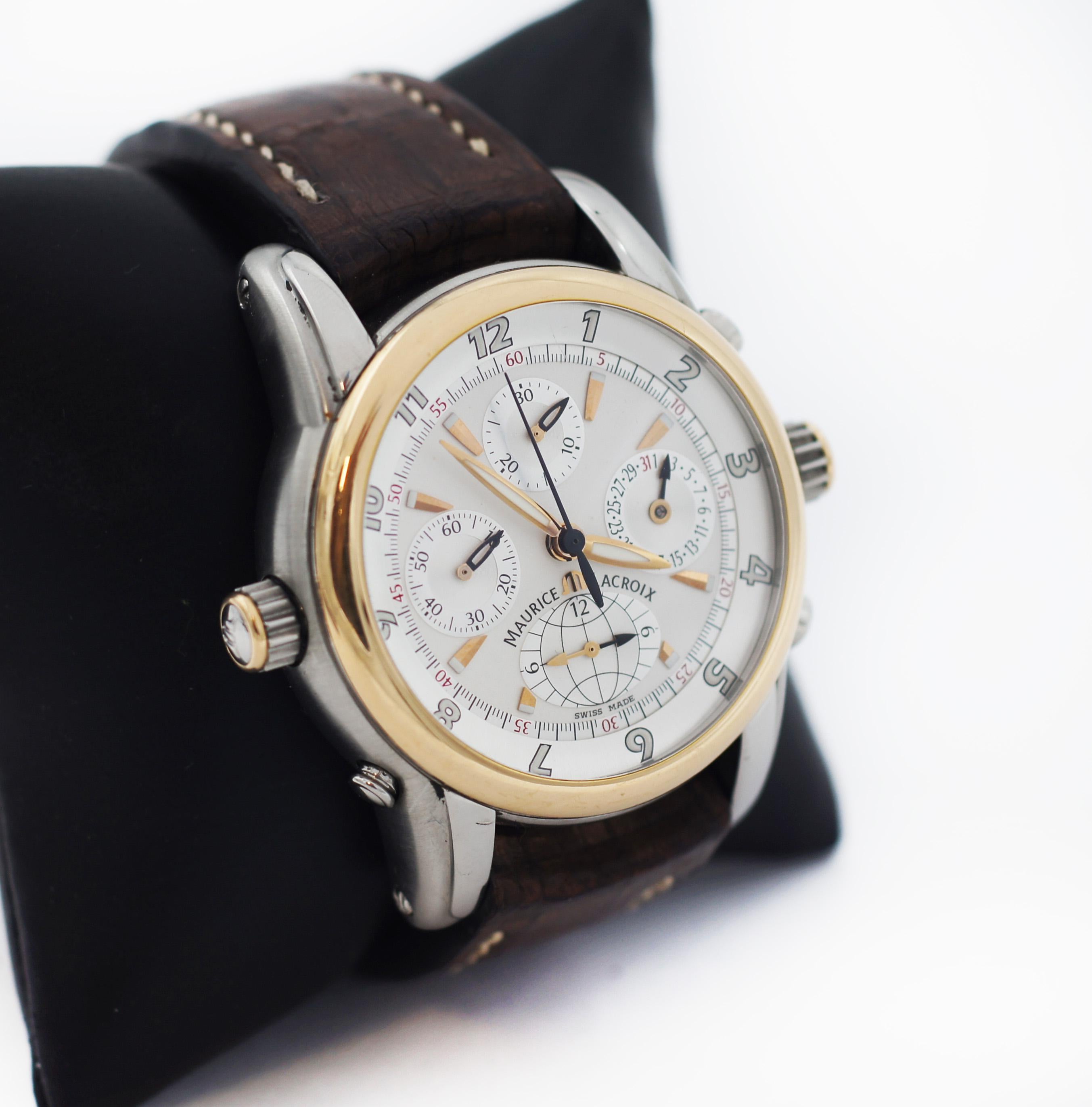 Maurice LaCroix
Model MP6398
Stainless Steel and 18K Gold Case
18K Gold fixed bezel 
White dial
White and black lined Arabic numerals, golden hour markers and hands
Luminescent hour, minute, hand and has second hands
Features Chronograph sub-dial