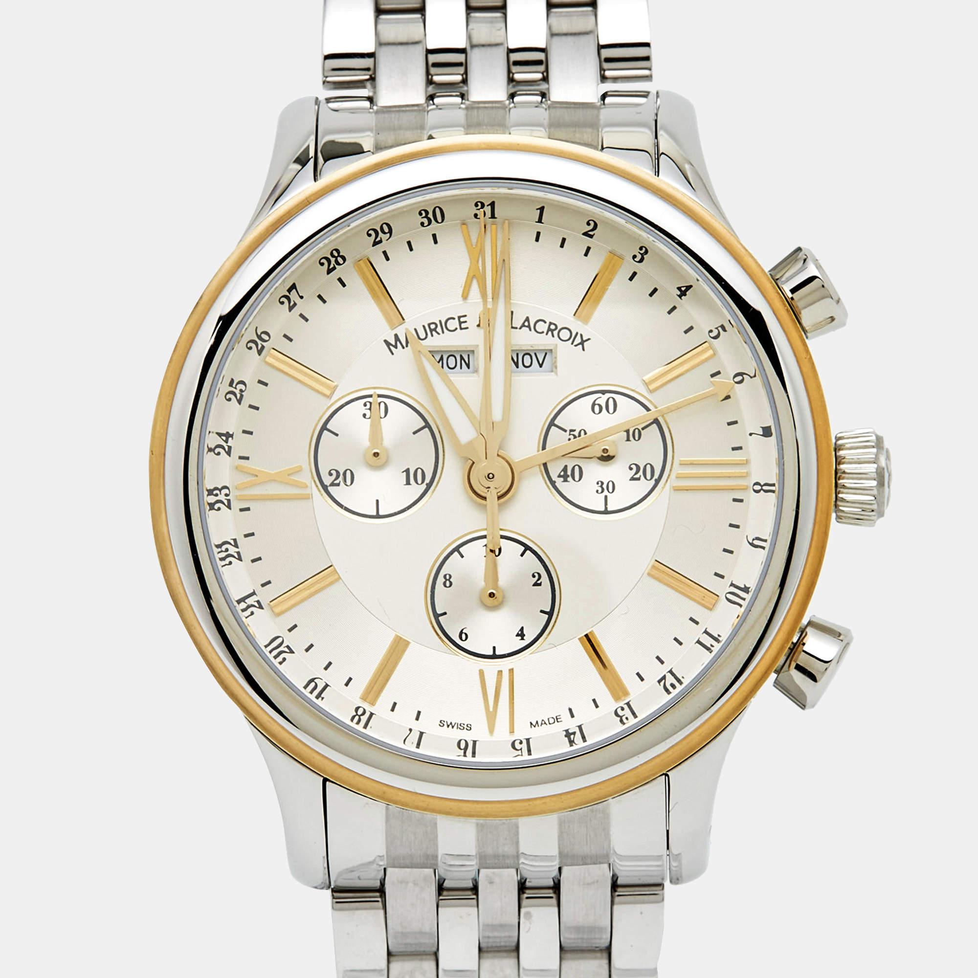 The Maurice Lacroix Les Classiques LC1098-SY011-11E is a sophisticated men's wristwatch with a 40mm case. It features a silver and gold-tone stainless steel bracelet, a white dial with a date display, and Roman numeral and index hour markers. This