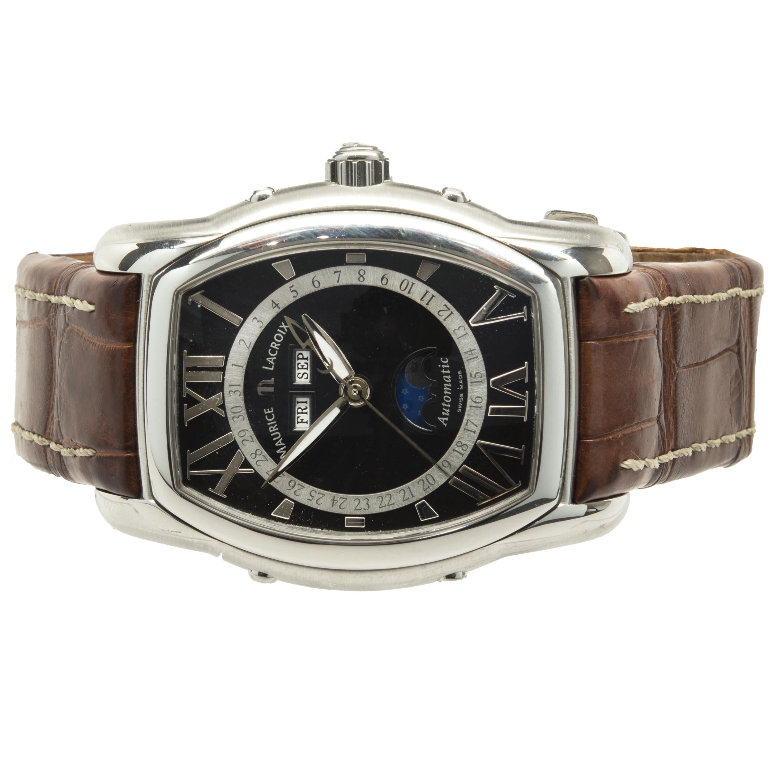 Movement: automatic
Function: hours, minutes, seconds, day, date, moonphase
Case: 39mm rectangular, smooth bezel
Bracelet: Maurice Lacroix brown crocodile strap, stainless steel deployment clasp
Dial: black roman, moonphase dial 
Serial #