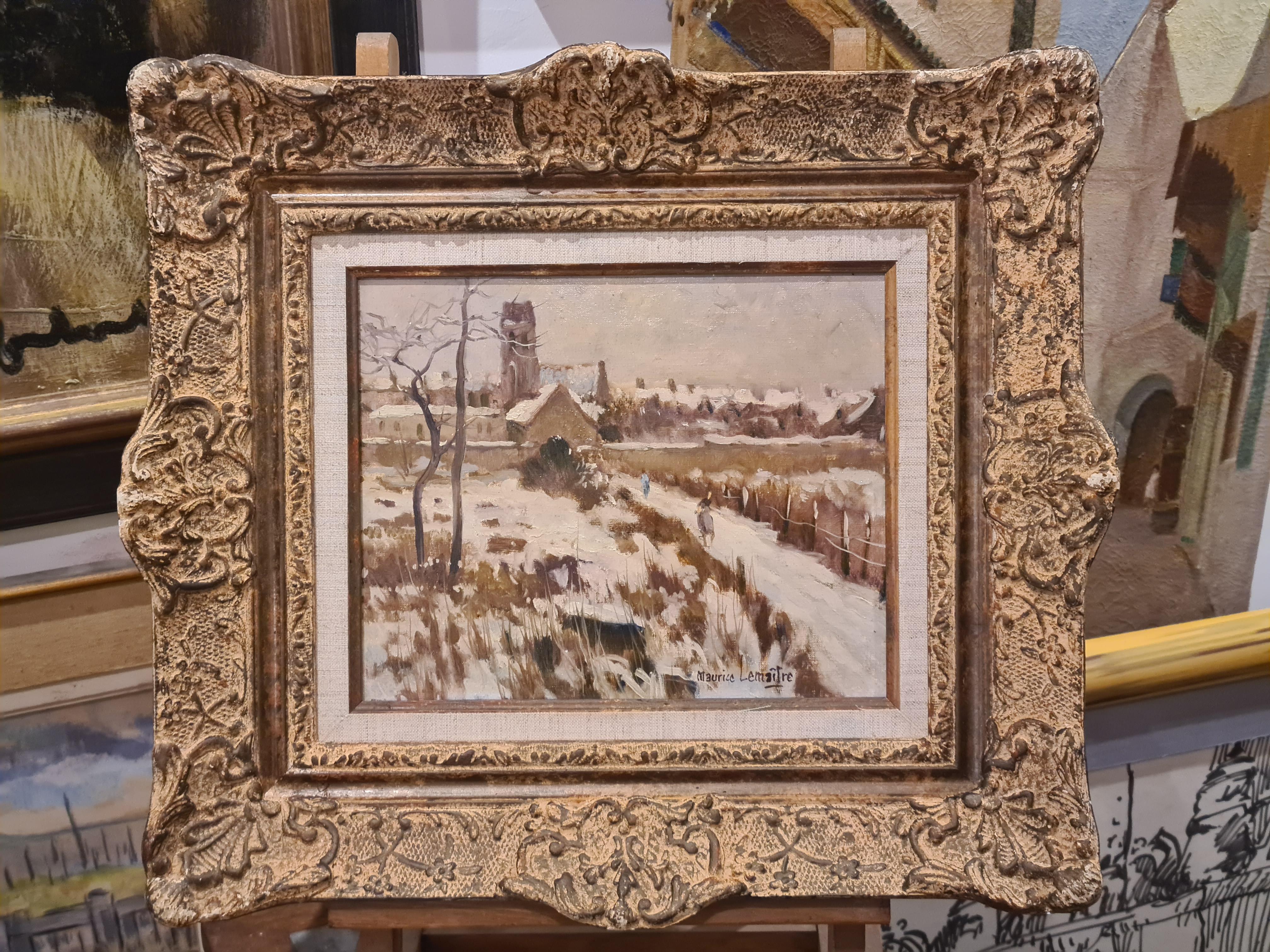 An oil on canvas view of a French village, Soignolles en Brie, in the snow by French artist Maurice Lemaître. Signed bottom right, located on the top rear stretcher. Presented in a fine Montparnasse gilt frame with cloth insert.

A wonderful