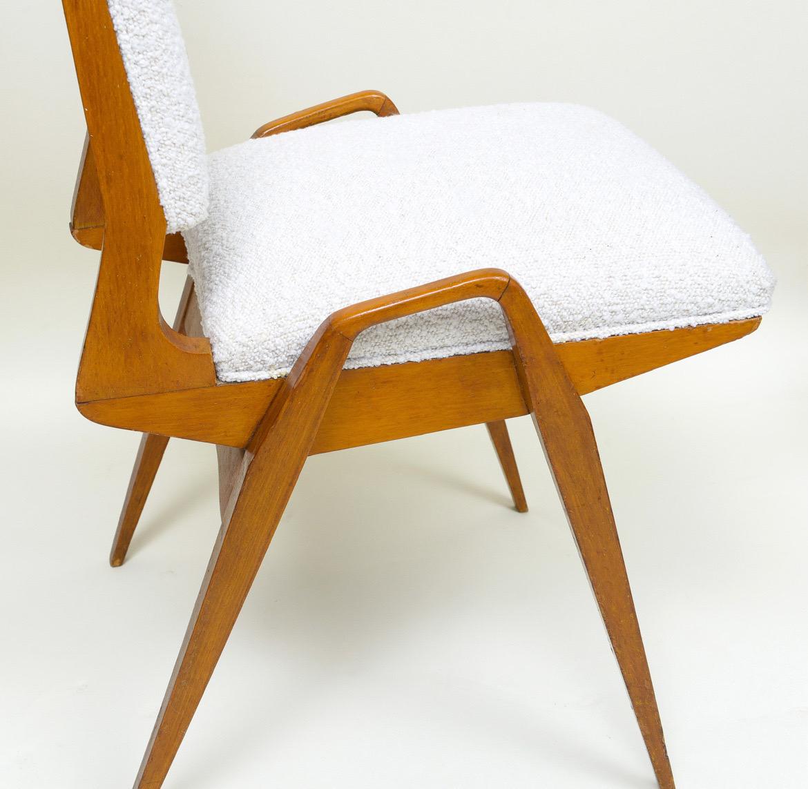  1 Maurice pre wood office chair white boucle wool, midcentury, France, 1950s-1960s.

Beautiful sculptural Maurice prechair. Re-upholstered in a white boucle. Wood in lovely original condition.
Measures: Depth 20 inches
Width 18 inches
Height 32