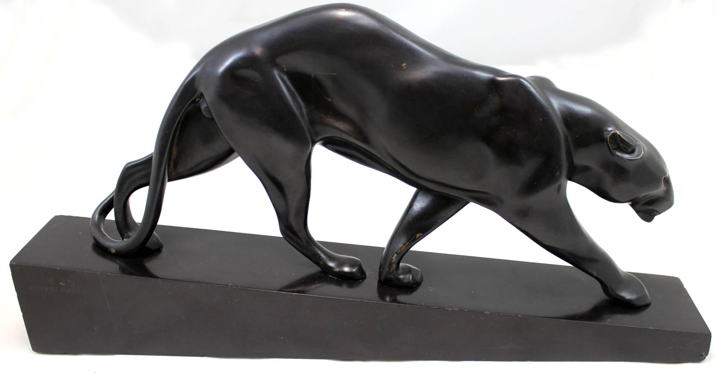 A wonderful patinated cast bronze sculpture of a black panther, titled “Panthere Marchant” by French artist Maurice Gaston Elie Joseph Prost (1894-1967). Prost initially studied under sculptor Léopold Morice and Charles Valton, who strongly
