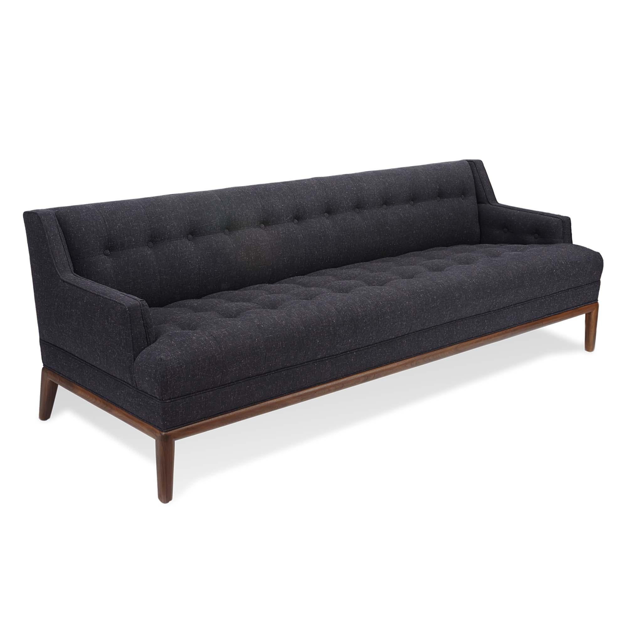 The Maurice sofa is a midcentury inspired sofa with a tufted seat, back, and inner arms and piped details. The sofa rests atop a simple, rounded American walnut or white oak base. 

The Lawson-Fenning Collection is designed and handmade in Los