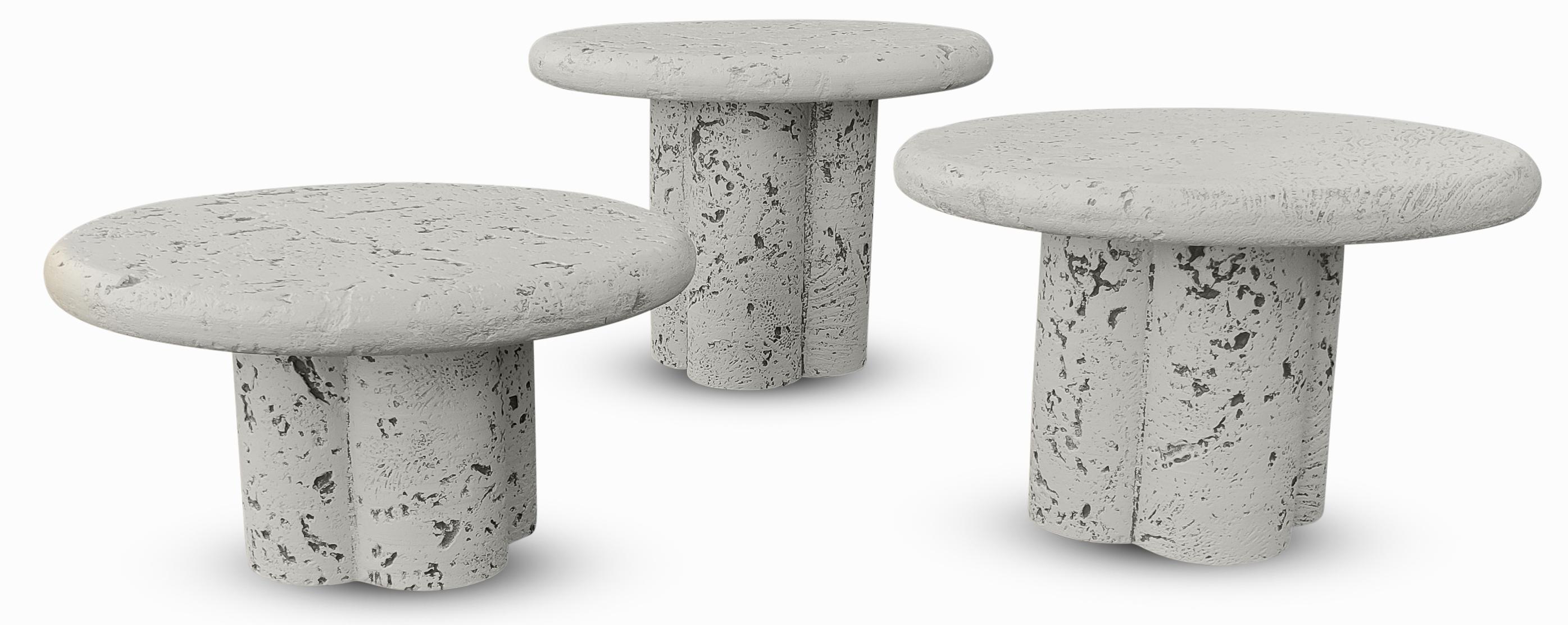A very cool set of three Post-Modern, Faux Coral or Fossil Stone, composition made, round nesting tables. Made and retailed by Maurice Villency in the late 1970s or early 80s, this set of tables is fresh from the upscale original home in Larchmont