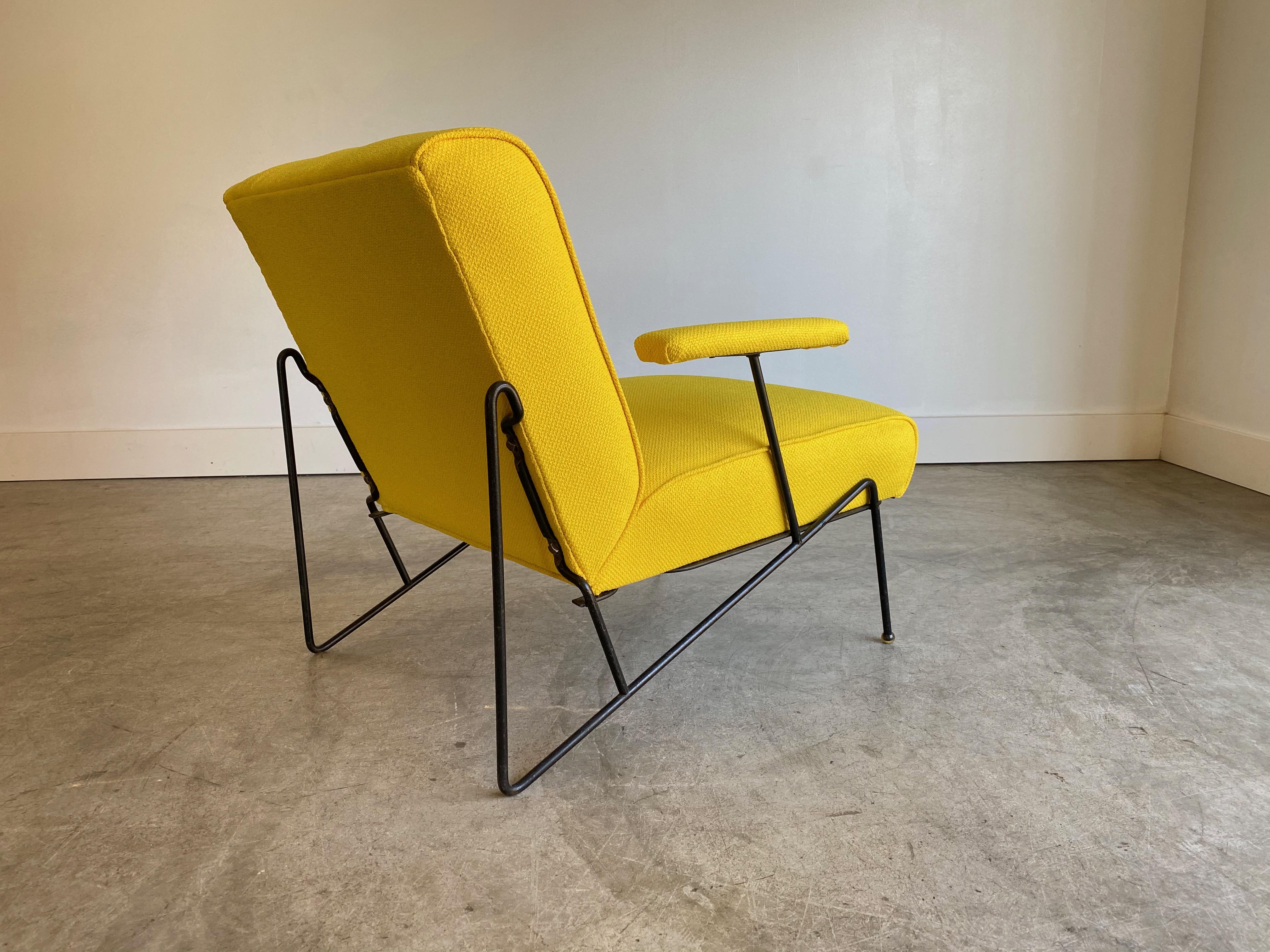 Designer: Mauricio Tempestini 
Manufacture: Salterini 
Period/style: Postmodern
Country: US 
Date: 1950s 

Newly reupholstered in yellow Knoll upholstery.