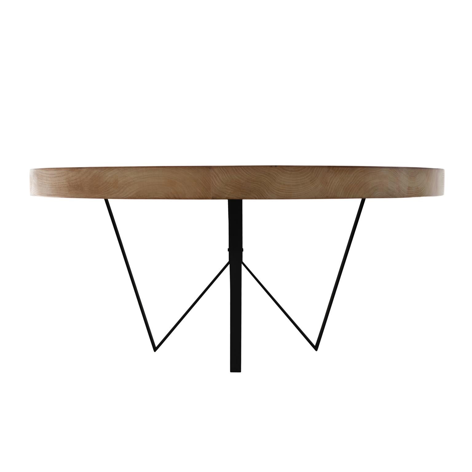 Maurits Reclaimed Oak Round Dining Table by Fred and Juul
Dimensions: Ø 160 x H 78 cm.
Materials: Reclaimed oak and black metal.

Available in round or stadium shape. Also available in different materials. Custom sizes, materials or finishes are