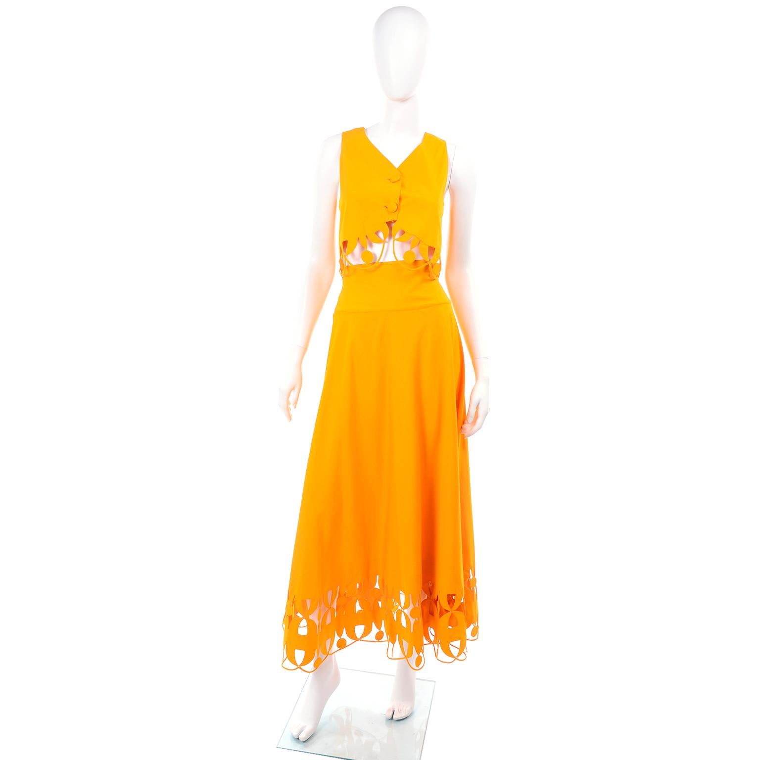 This is a fabulous, rare vintage marigold yellow cotton ensemble designed by Italian designer, Maurizio Glanate in the 1990's. This vintage outfit can be worn casually or at a more formal event depending on the accessories you choose to wear with