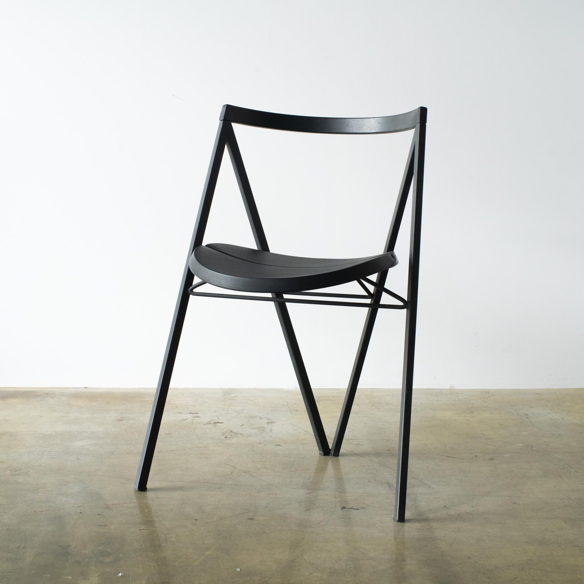 Tarzan chair designed by  Paolo Pedrizzetti and Davide Mercatali for Zeus.
Black painted steel body with rubber seat and back. Rubber is excellent condition.  Great piece of 1980s. Probably made in the late 1980s or early 90s.