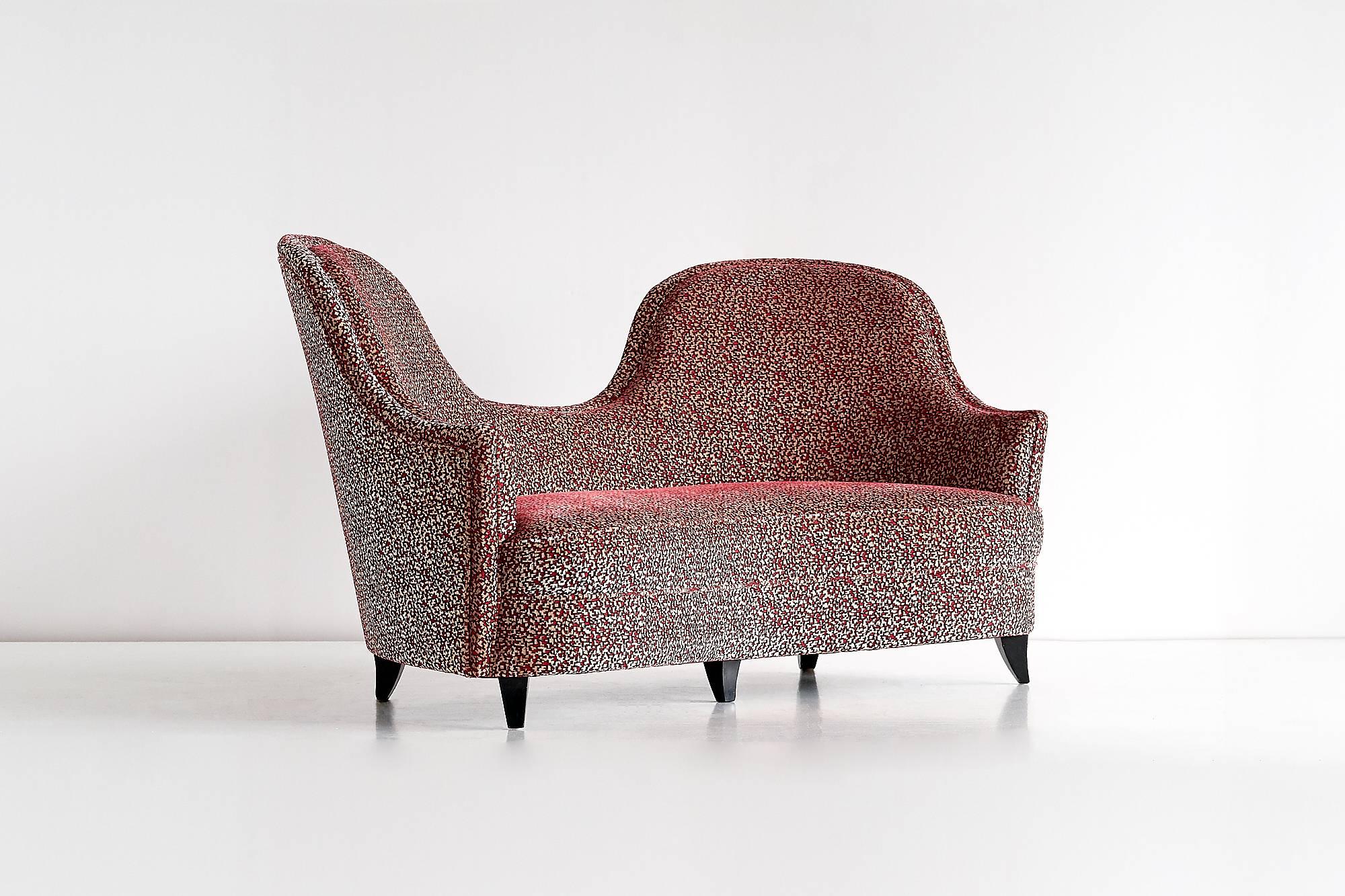 This bijou two-seat sofa was designed by Maurizio Tempestini, circa 1940 and produced by Mario Tamberli in Florence. The sofa was a custom design for the Casa Innocenti Settepassi, the private residence of the Settepassi's, an established family of