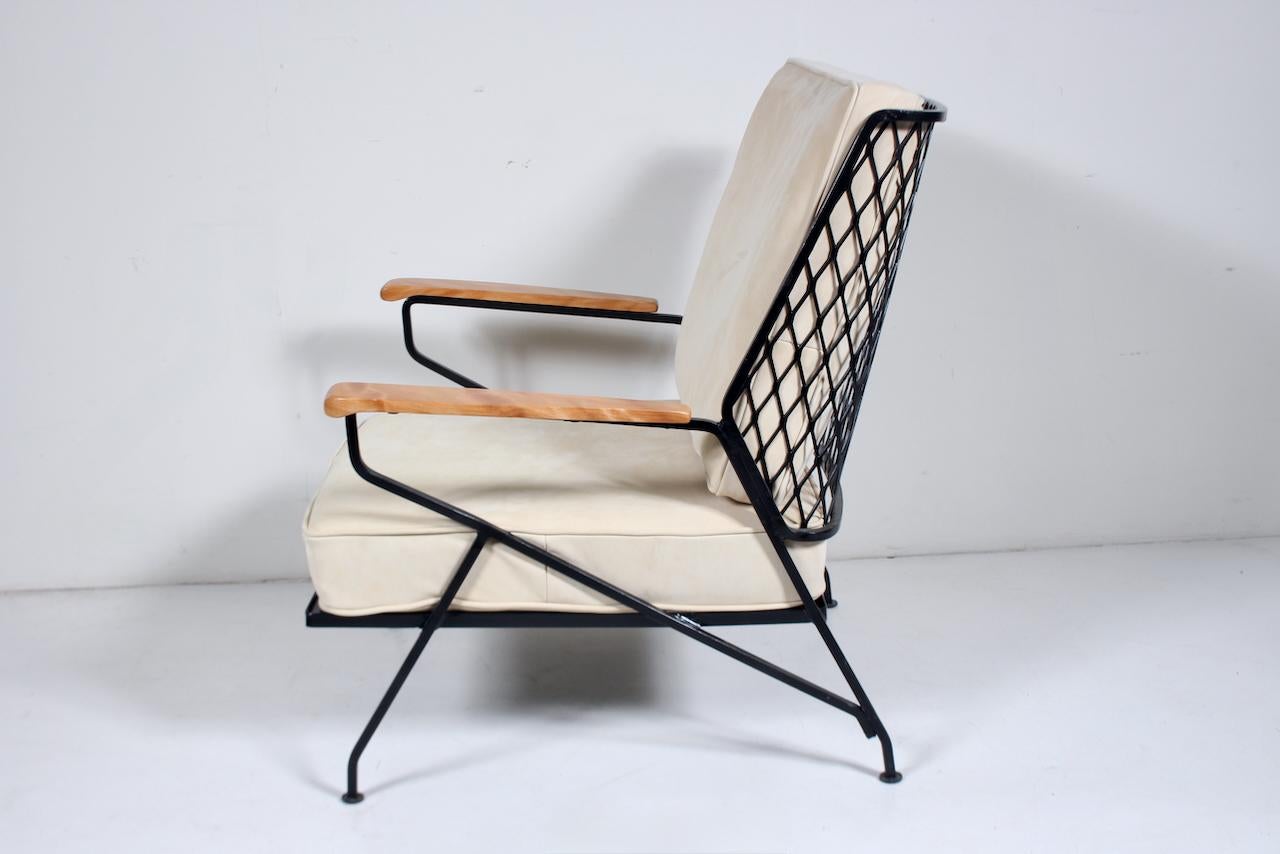 Restored Maurizio Tempestini for John Salterini Wrought Iron, Flame Birch and Leather Lounge Chair, 1950's. Featuring smooth, sturdy, ergonomic Wrought Iron hoop construction with expanded iron wire back and side detail with solid seating surface.