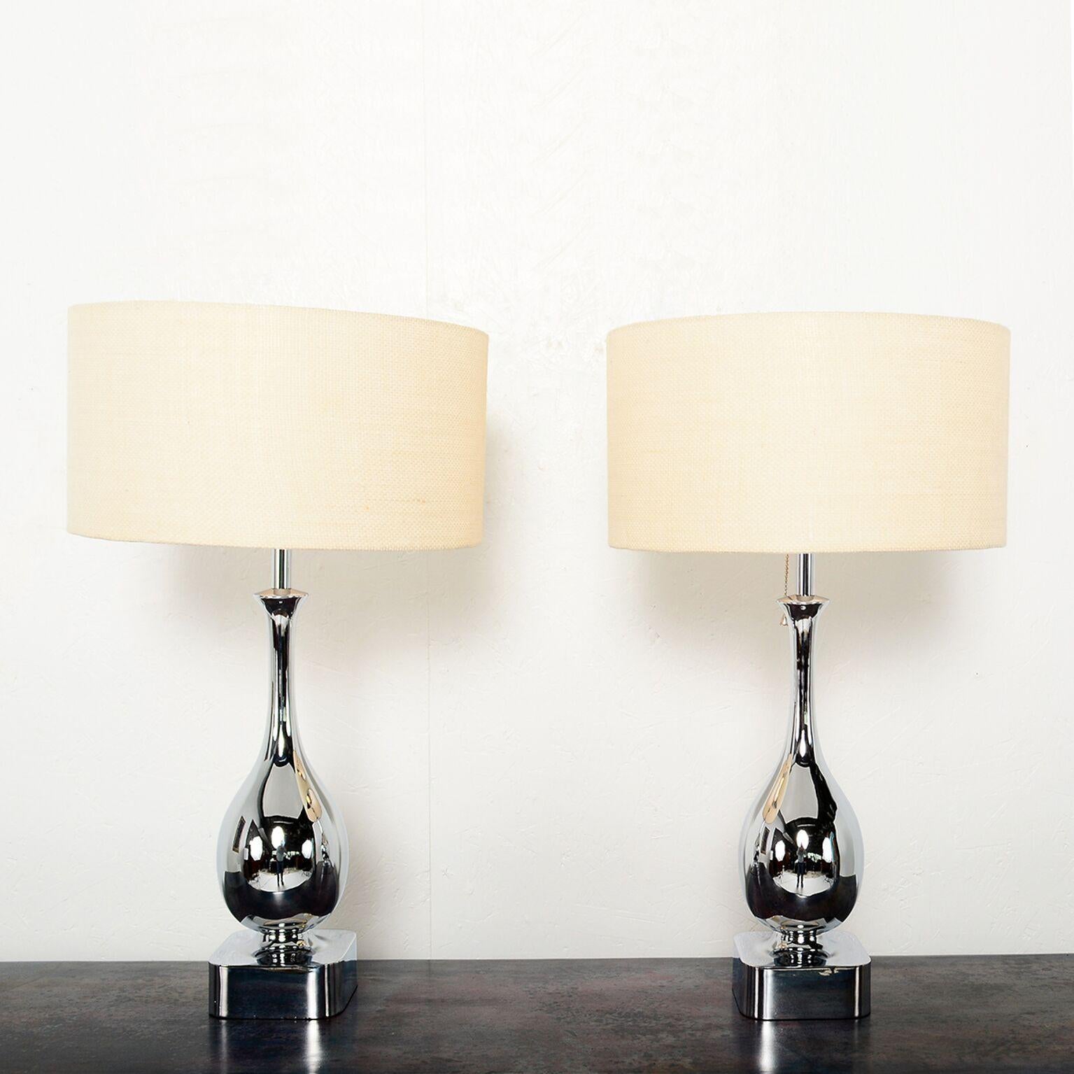 For your consideration: a pair of chrome-plated table lamps attributed to Laurel Lamp Co. by Maurizio Tempestini. New chrome-plated finish and rewired. Lamps in mint condition ready to go. Beautiful clean modern design. Lamp shades not included. For
