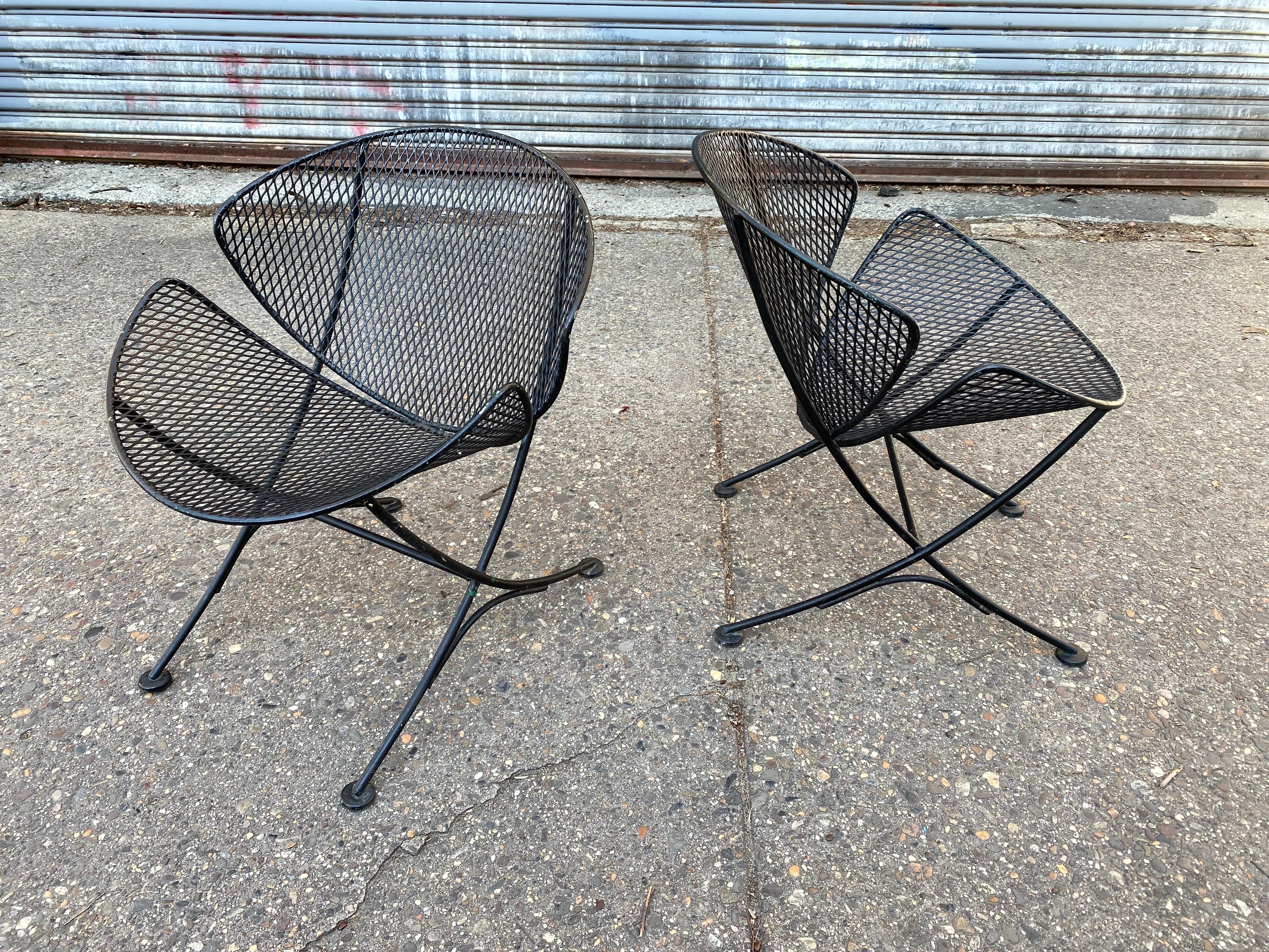 Pair of Tempestini for John Salterini Clam shell chairs. Painted black, in nice shape. Older paint that still presents well. Nice small scale but still very comfortable! Iconic Design from Salterini!