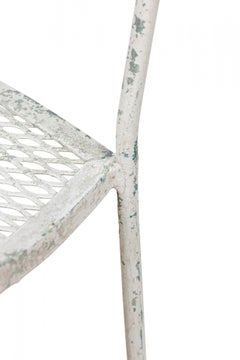 Sedie da pranzo in ferro battuto dipinte "Ribbon" di Maurizio Tempestini per Salterini