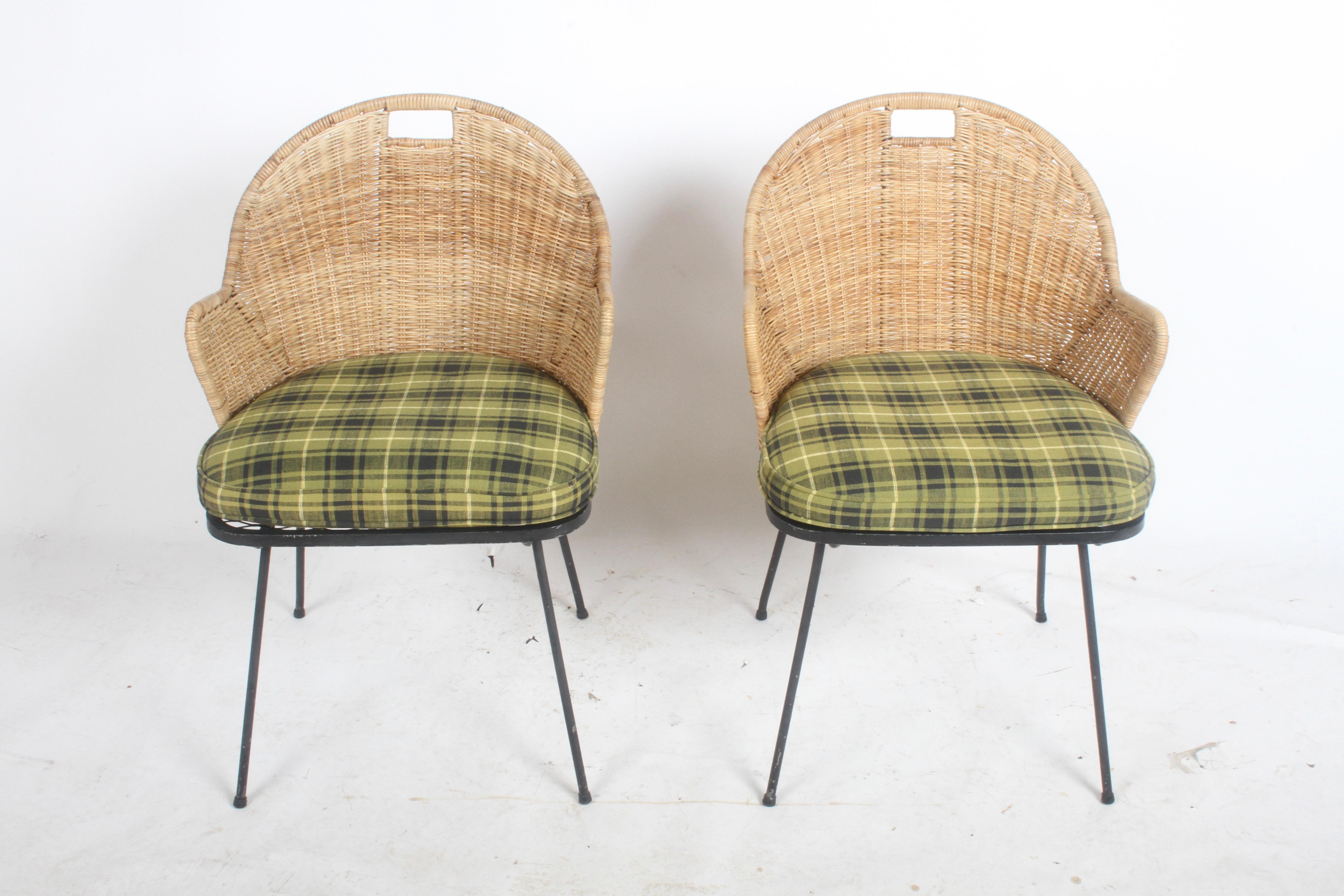 Set of 4 Maurizio Tempestini for Salterini black wrought & wicker patio or sunroom dining chairs with vintage green / black and creme plaid seat cushions over diamond mesh seats. Part of Salterini Neva-Rust series , these chairs are in nice