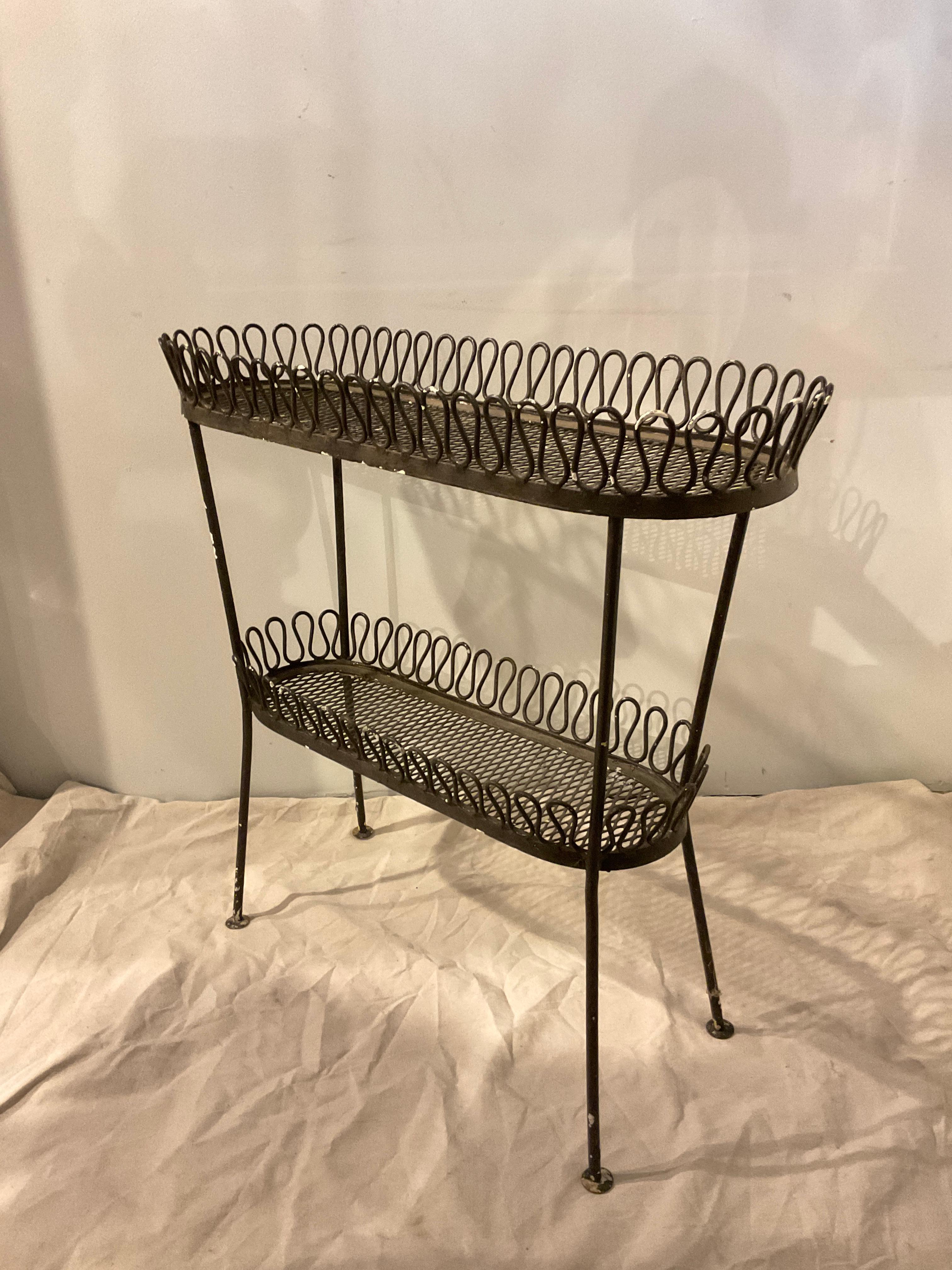 1960s Tempestini for Salterini ribbon back iron plant stand. Some white paint on stand.