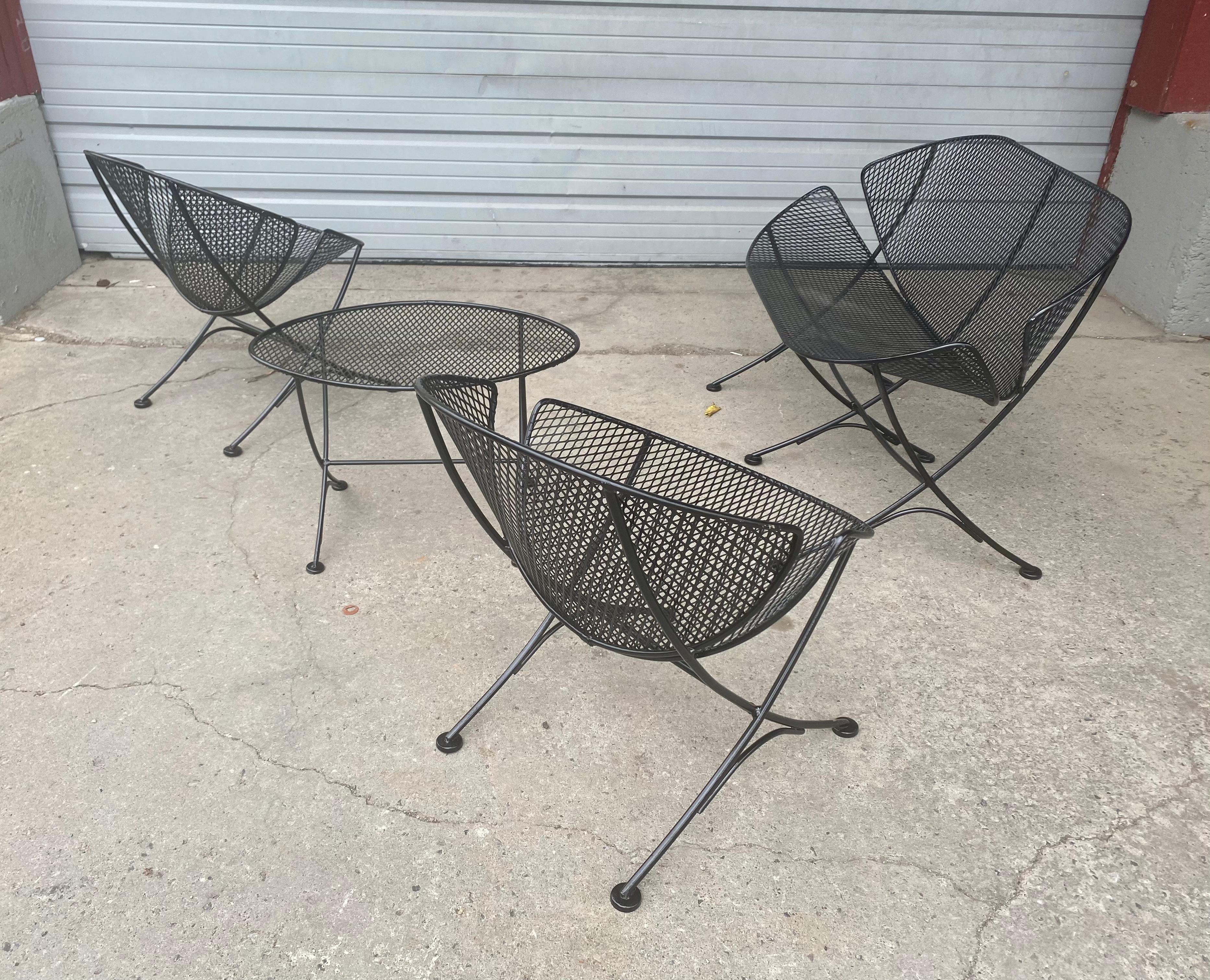 Rare four-piece set of Maurizio Tempestini clam shell set 2 chairs, settee and table Produced by Salternini in the 1950s classic modernist design. Extremely comfortable, Hand delivery avail to New York City or anywhere en route from Buffalo NY. The