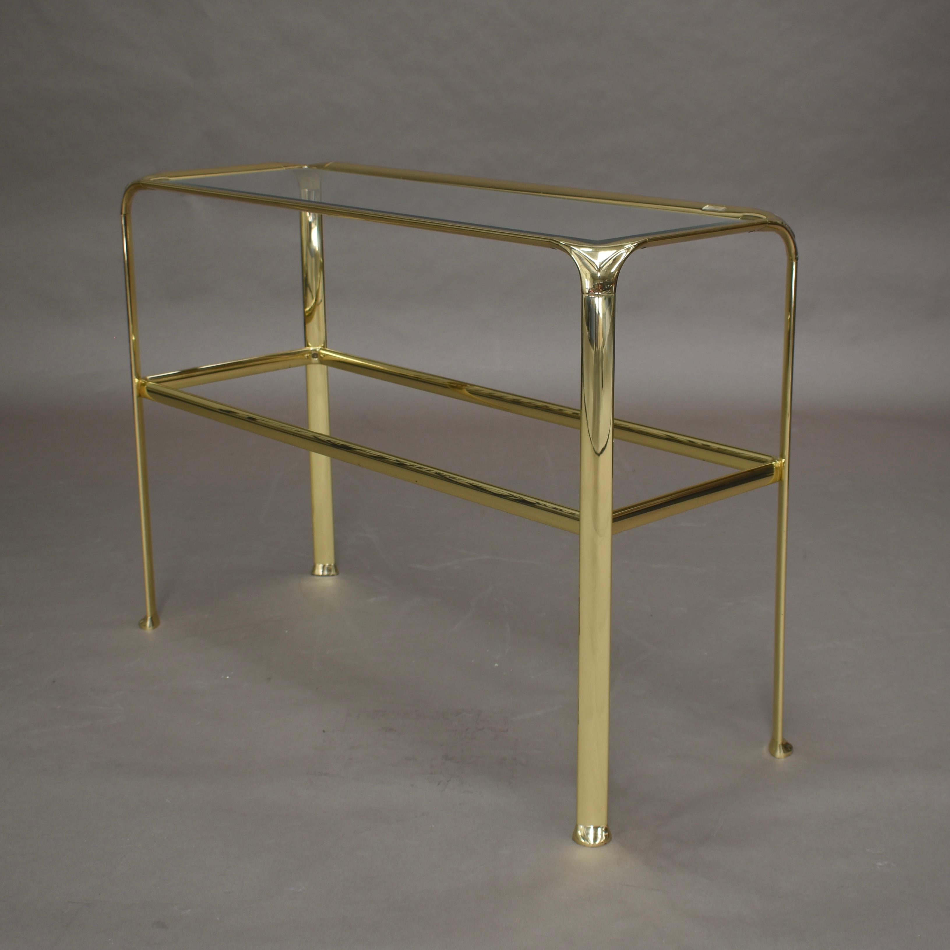 Console table in brass and glass by Mauro Lipparini, Italy, circa 1970. 

Designer: Mauro Lipparini

Country: Italy

Material: Brass / Glass

Design period: 1970s

Date of manufacturing: 1970-1980

Size wdh in cm: 101 x 37 x 73