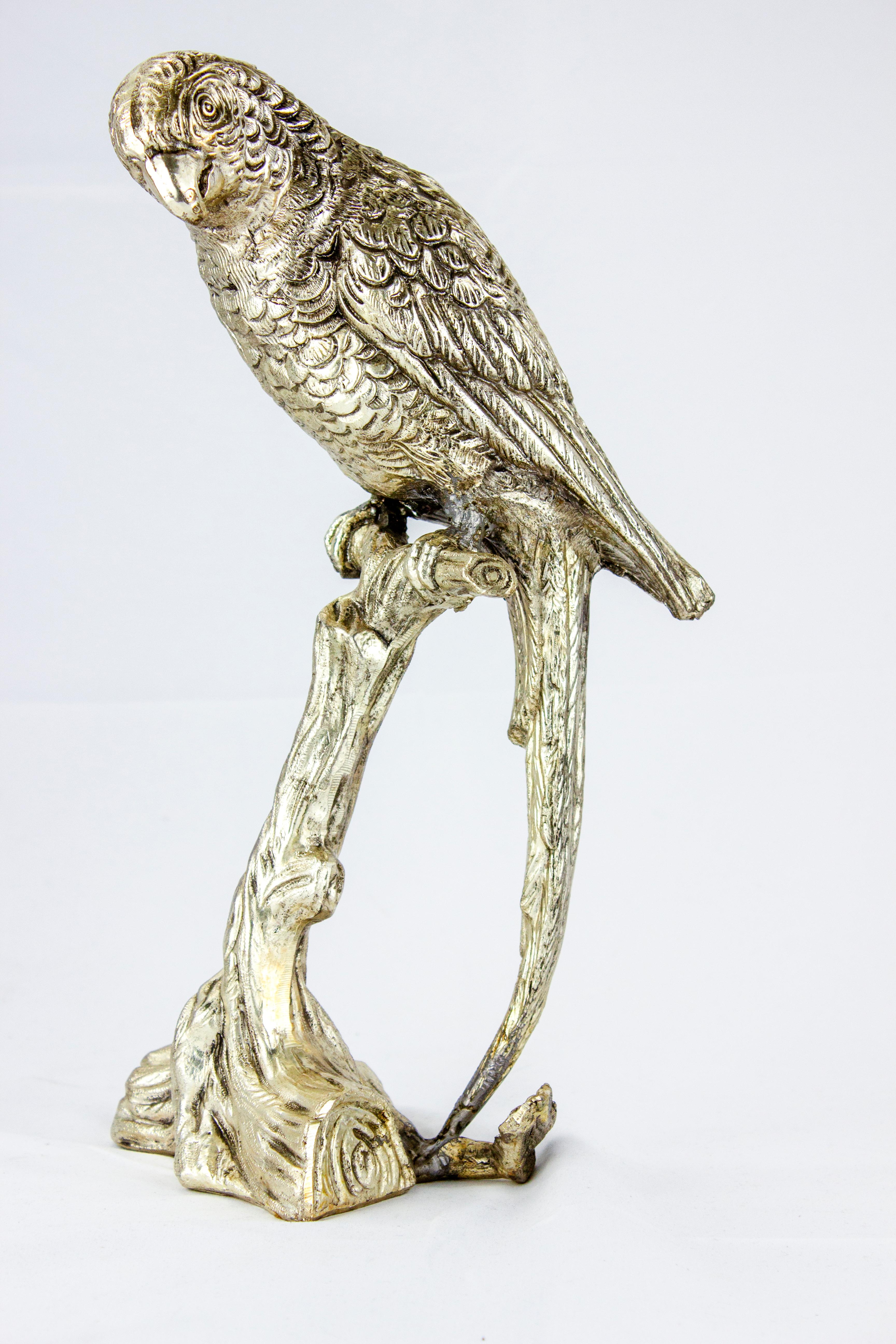 Discover the exquisite and rare silver-plated parrot statuette, designed by the renowned Mauro Manetti for Fonderia d'Arte in Firenze, Italy. This piece is truly unique and one-of-a-kind, as the way the parrot looks depends on the light it's exposed