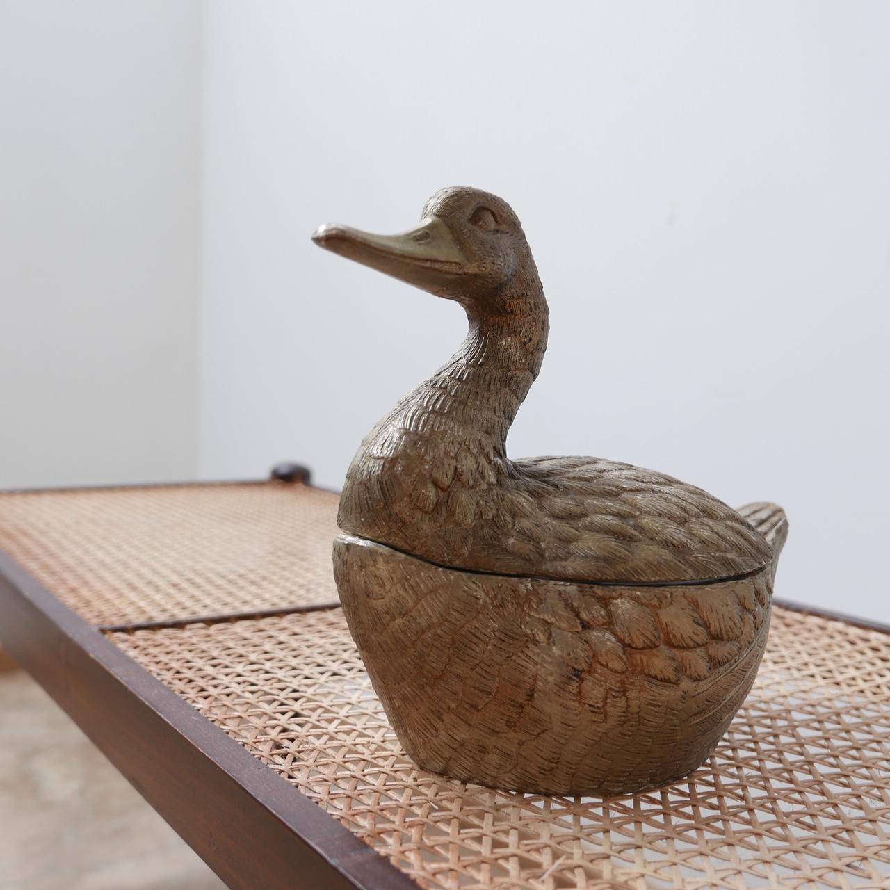 A Mauro Manetti 1960s 'Duck' shaped ice bucket, from Italy. 

There isn't a makers mark but this is a known model. 

In good vintage condition retaining it's original liner, but there is evidence of wear commensurate with age. 

Highly