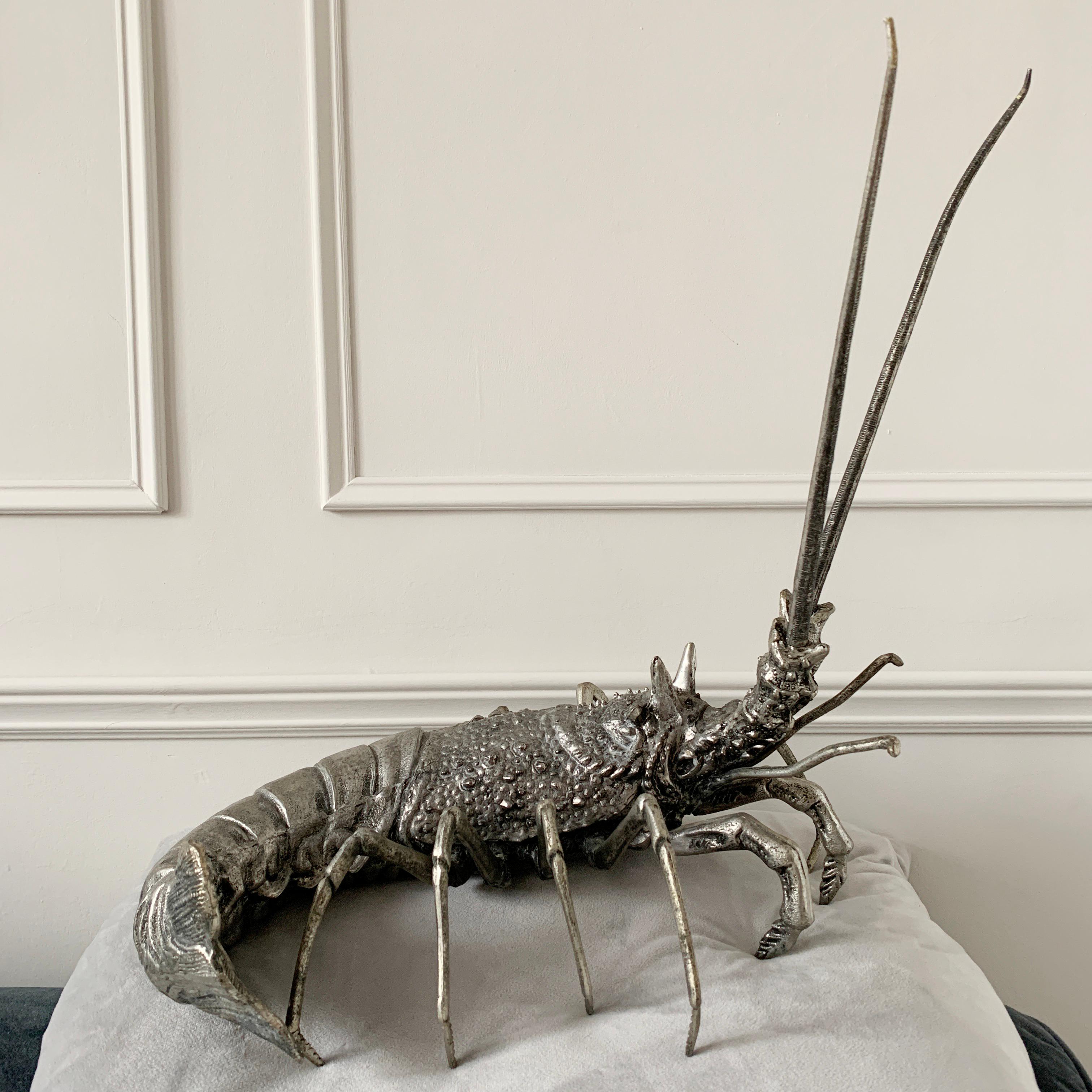Mauro Manetti large lobster sculpture
Pewter
Italy, 1950s-1960s
The lobster still has its high shine silver finish it has both its original antennae
It is stamped on the underside with the Classic ‘ M M’ Mauro Manetti, Italy, Firenze, Peltro