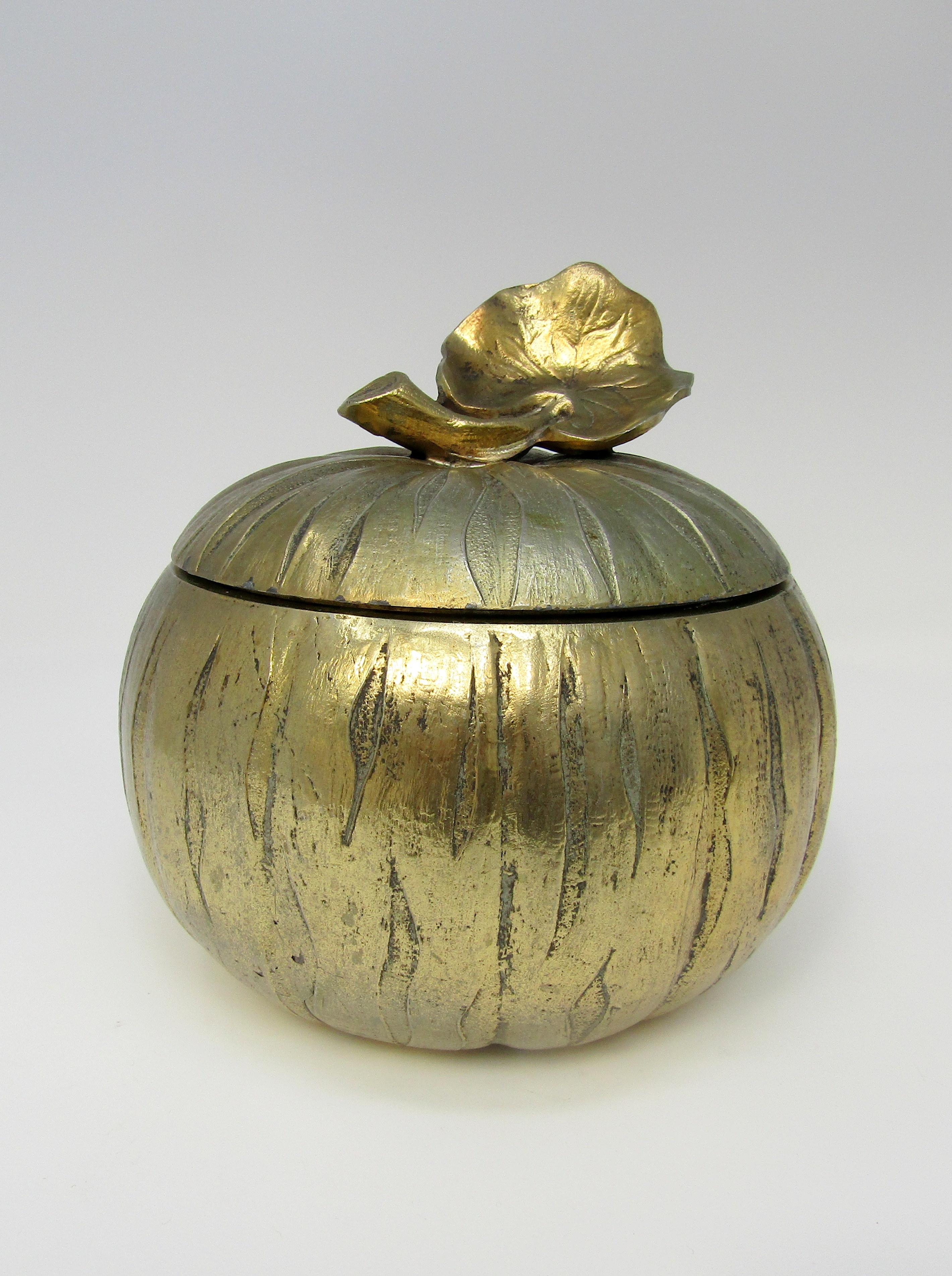 A gilded metal ice bucket in the shape of
a pumpkin by Mauro Manetti
Italian, circa 1970

Measures: Height 7 ½ in / 19 cm
Diameter 7 in / 18 cm.