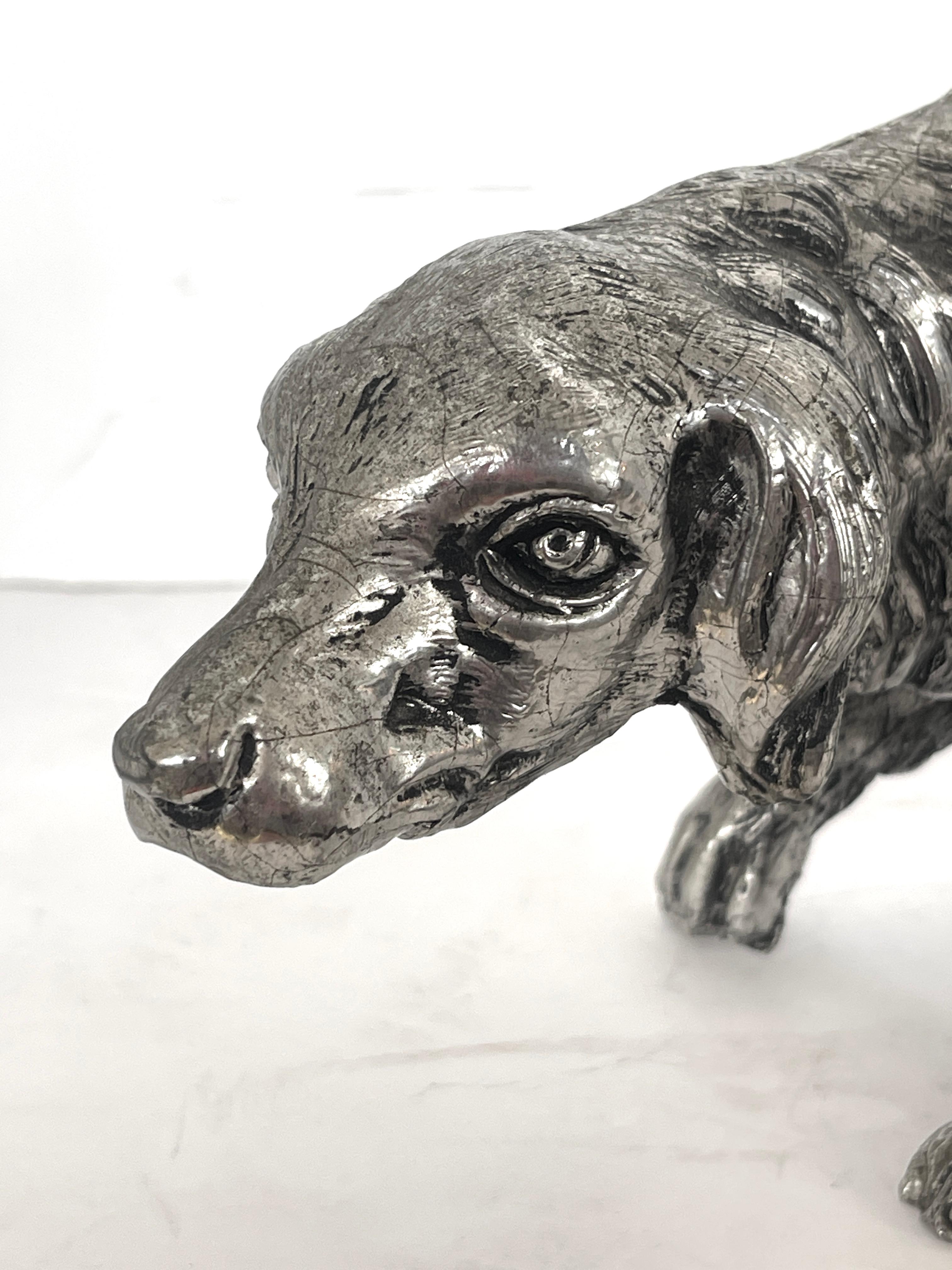 Just in this very goo looking English setter  ready to hunt.
It is  by the well know Italian Mauro Manetti Italian artist,, made in Florence in the 70s.
This dog is metal and sis Sliver plated. 
It is marked in hollow underneath the dog.
Please view