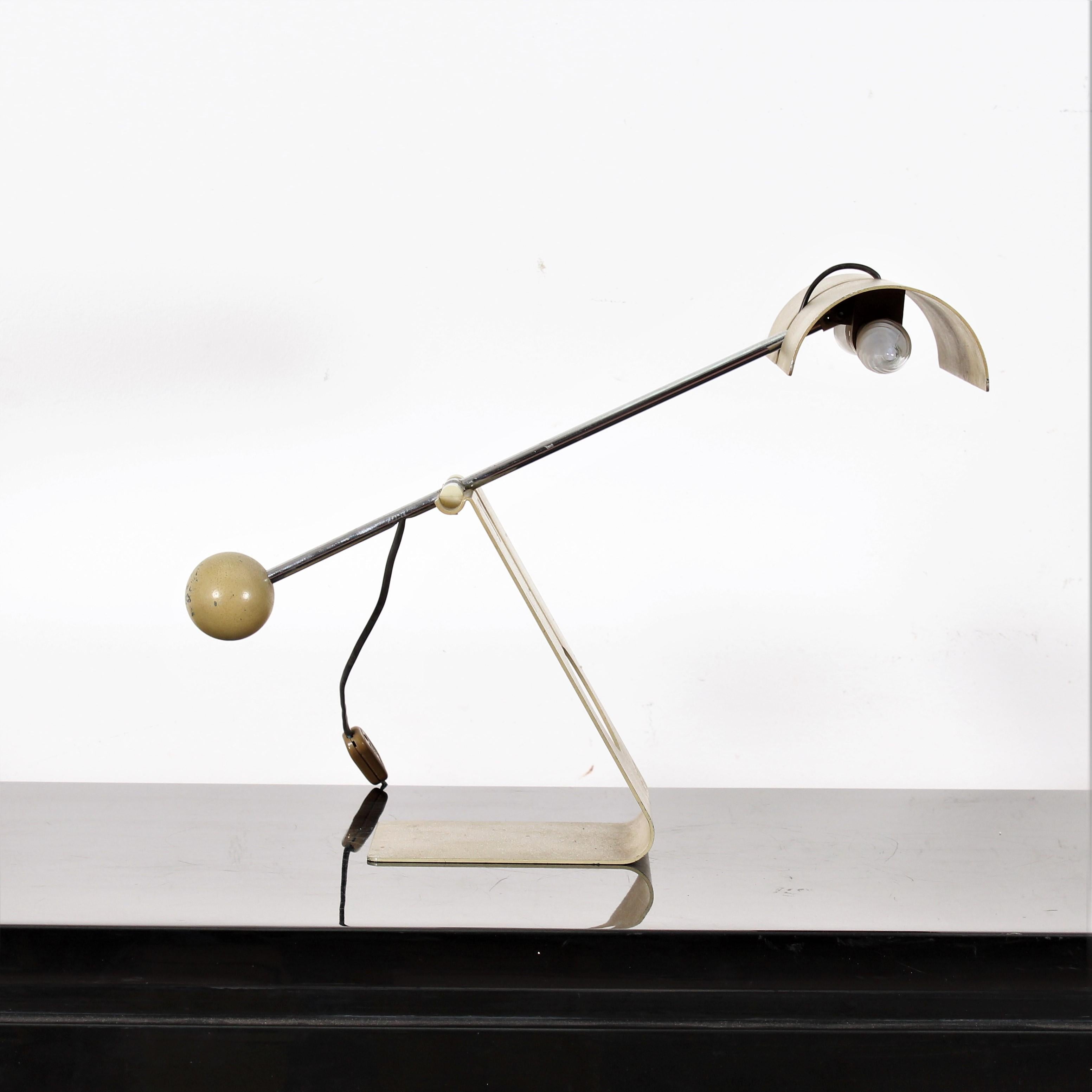 This metal table lamp is designed by Mauro Martini for Fratelli Martini, in Italy, 1960s.
The name 