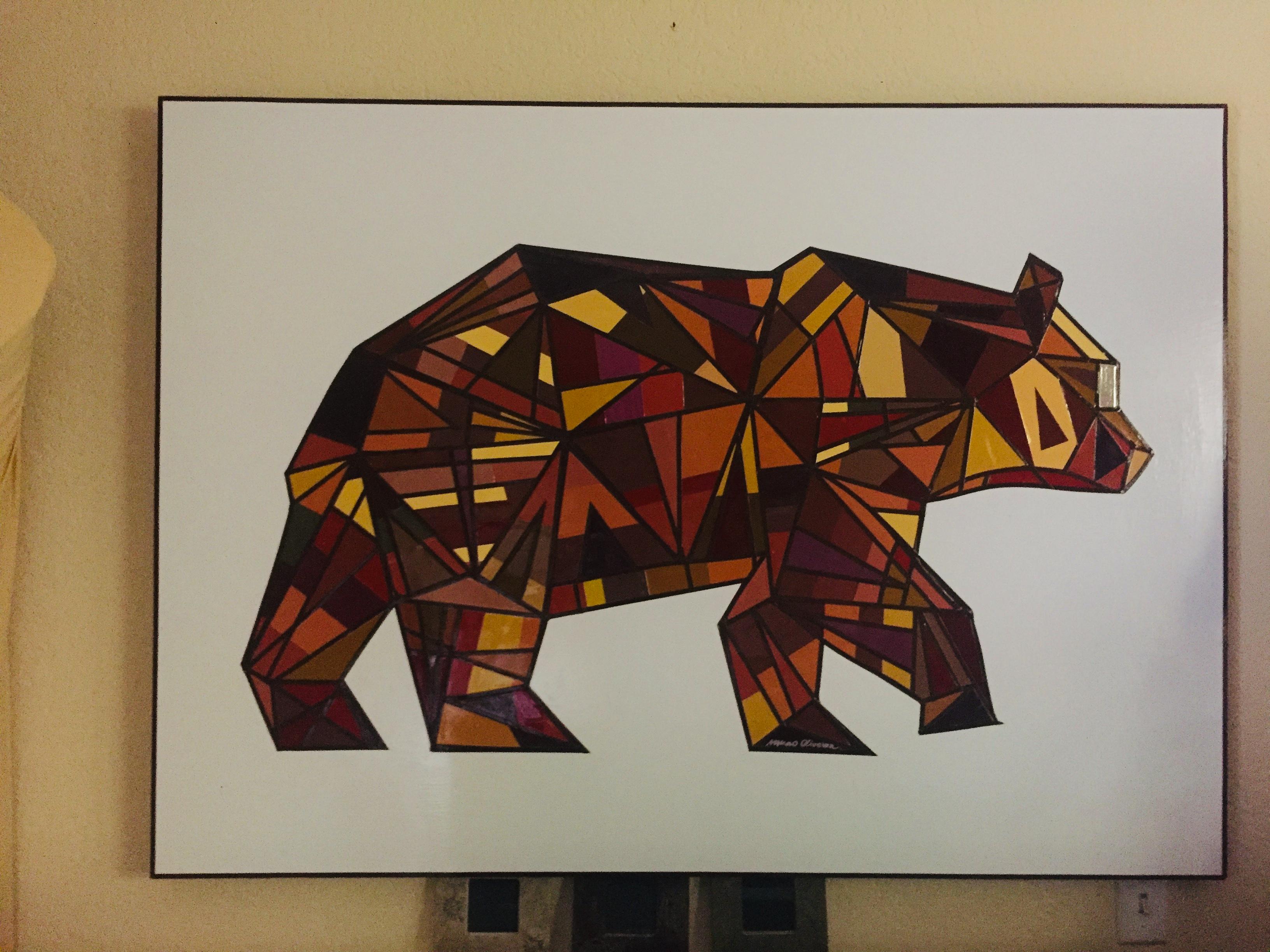 This original California Lucky Bear design is composed of mosaic sections and each section is glued with different color samples on wood panel. A few coats of a glossy varnish were applied to protect the piece. The result is a beautiful piece with 3