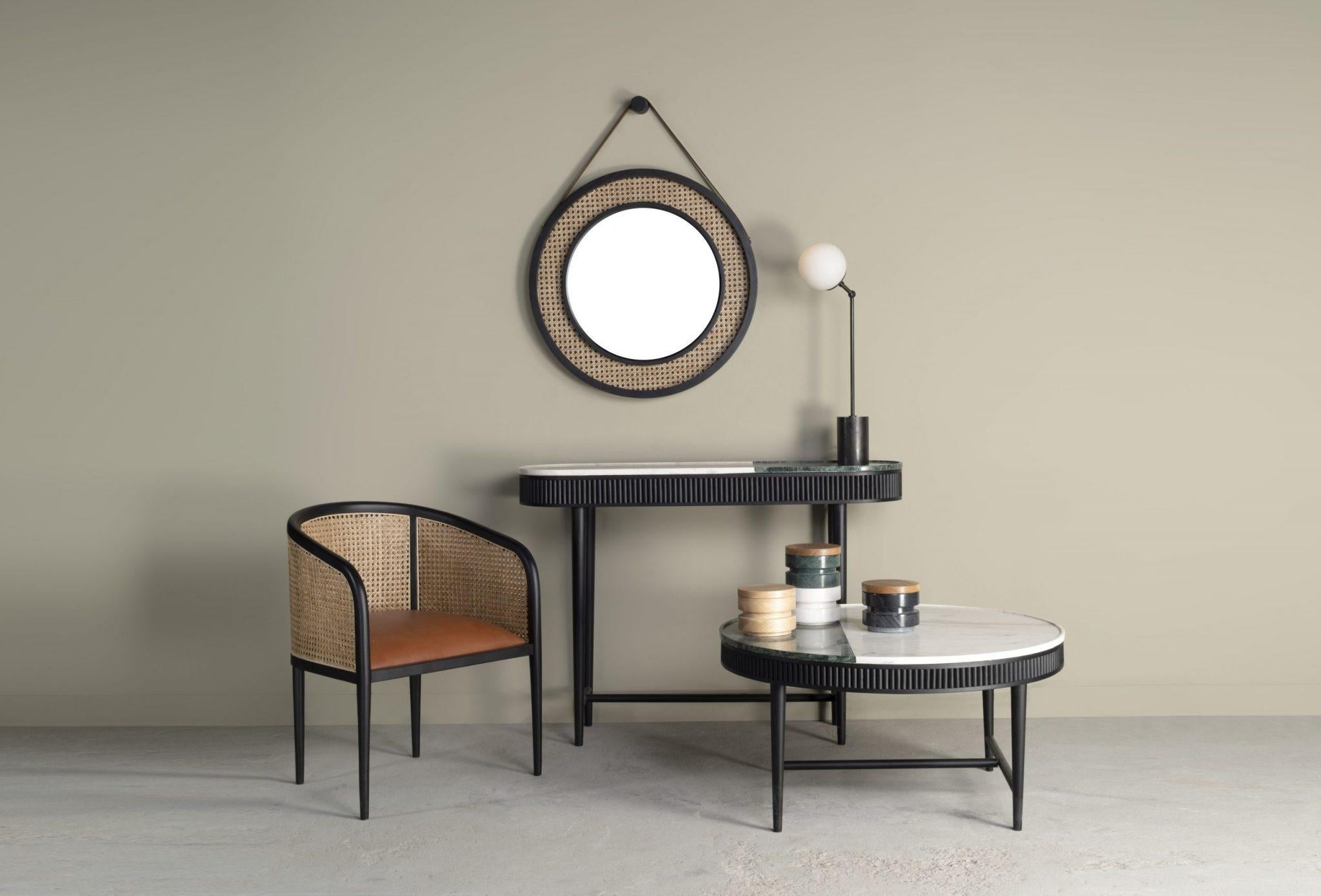 The Mausam Console features a delicate reeded detail and is available with either two-toned marble top or plain black, green or white marble. Perfect for a lobby, lounge or bedroom, this versatile piece of design provides a hint of style and