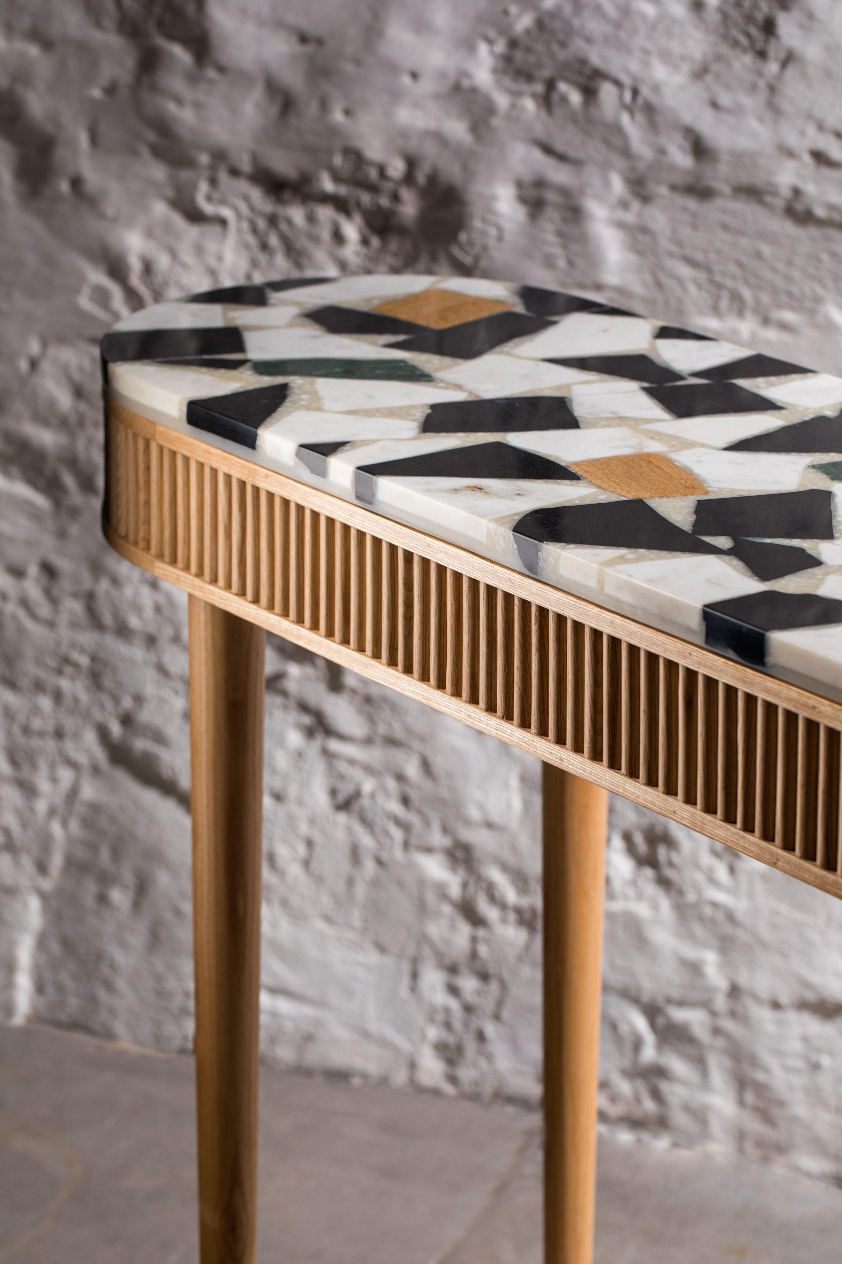 The Mausam Console with a recycled marble terrazzo top, lends from the first version of the Mausam console. Adapting the piece to incorporate a waste reducing method, the top of the piece is made from marble off cuts set into resin, aiming to reduce