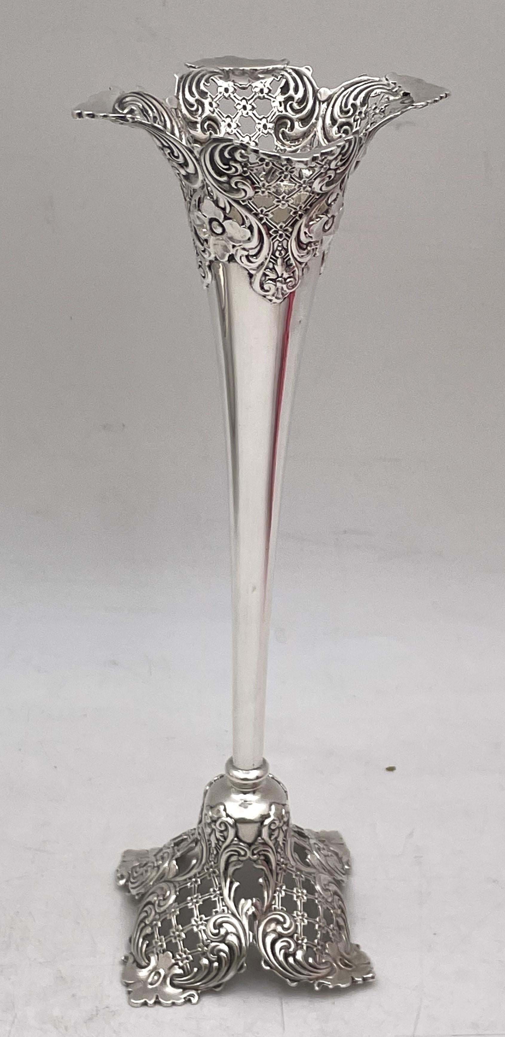 Mauser sterling silver bud vase in Art Nouveau style from the late 19th or early 20th century, beautifully adorned with pierced and floral motifs. It measures 9'' in height by 3 1/3'' in diameter at the top, weighs 4.1 troy ounces, and bears
