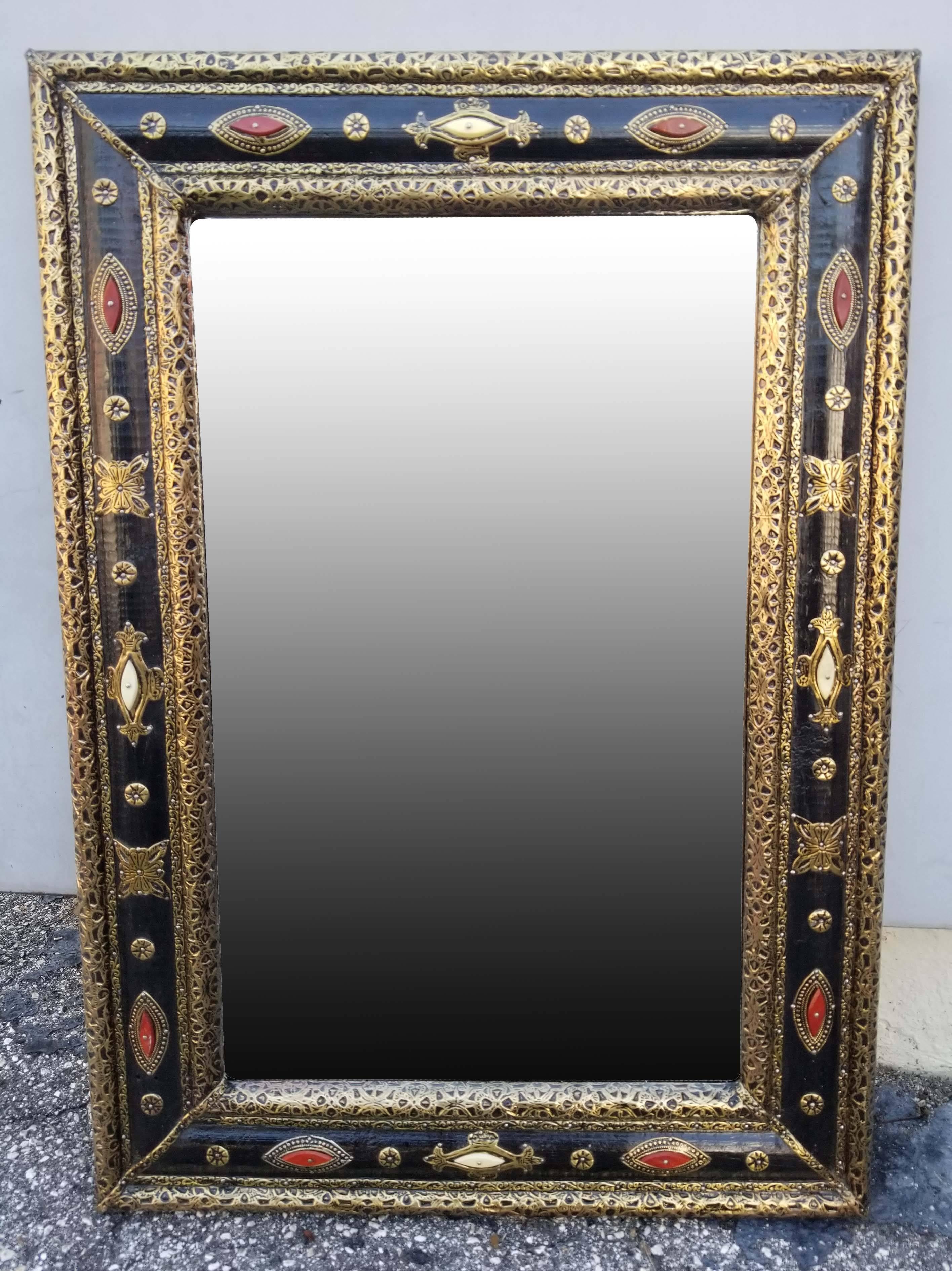 Large metal inlaid and camel bone Moroccan mirror. Made in the city of Marrakech. Rectangular shape measuring approximately 28