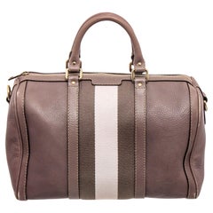 Mauve Gucci Boston bag with gold-tone hardware, dual rolled top handles