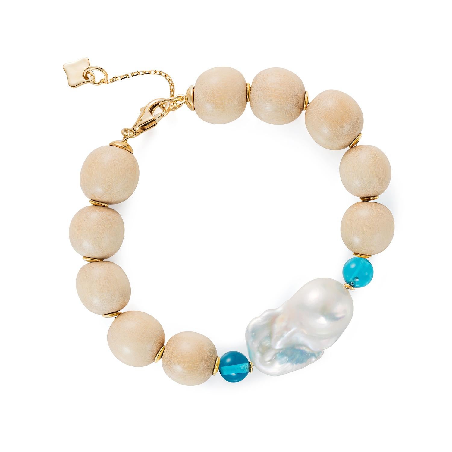Our Wooden Bracelet Series are meant to be worn layered, showing all the wonderful gemstones, whether they be Turquoise, Baroque Pearls and our colourful gemstones of exceptional quality.

The Turquoise bracelet compromises turquoise stones that are