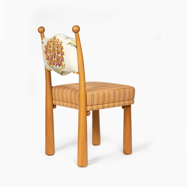 Chair upholstered with an embroidered natural fabric from Schumacher.
Woodwork for the base and the structure of the backrest in golden oak sanded.
 