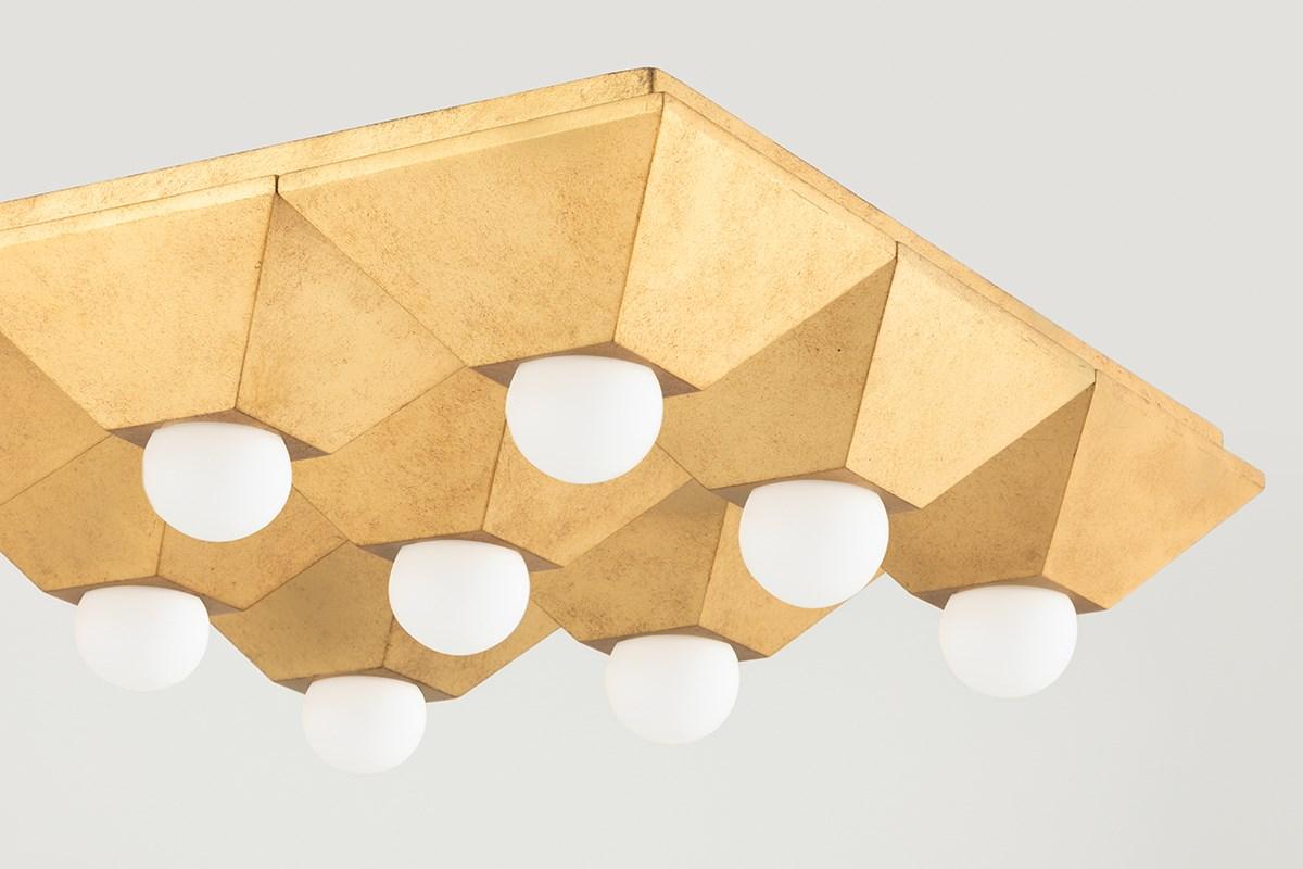 Playing with shapes. 
Max gives simple geometry and maximum style.
A series of pyramid bases supporting round globe lights come together to form squares and rectangles.
The vintage gold or silver leaf finishes add to the design's overall