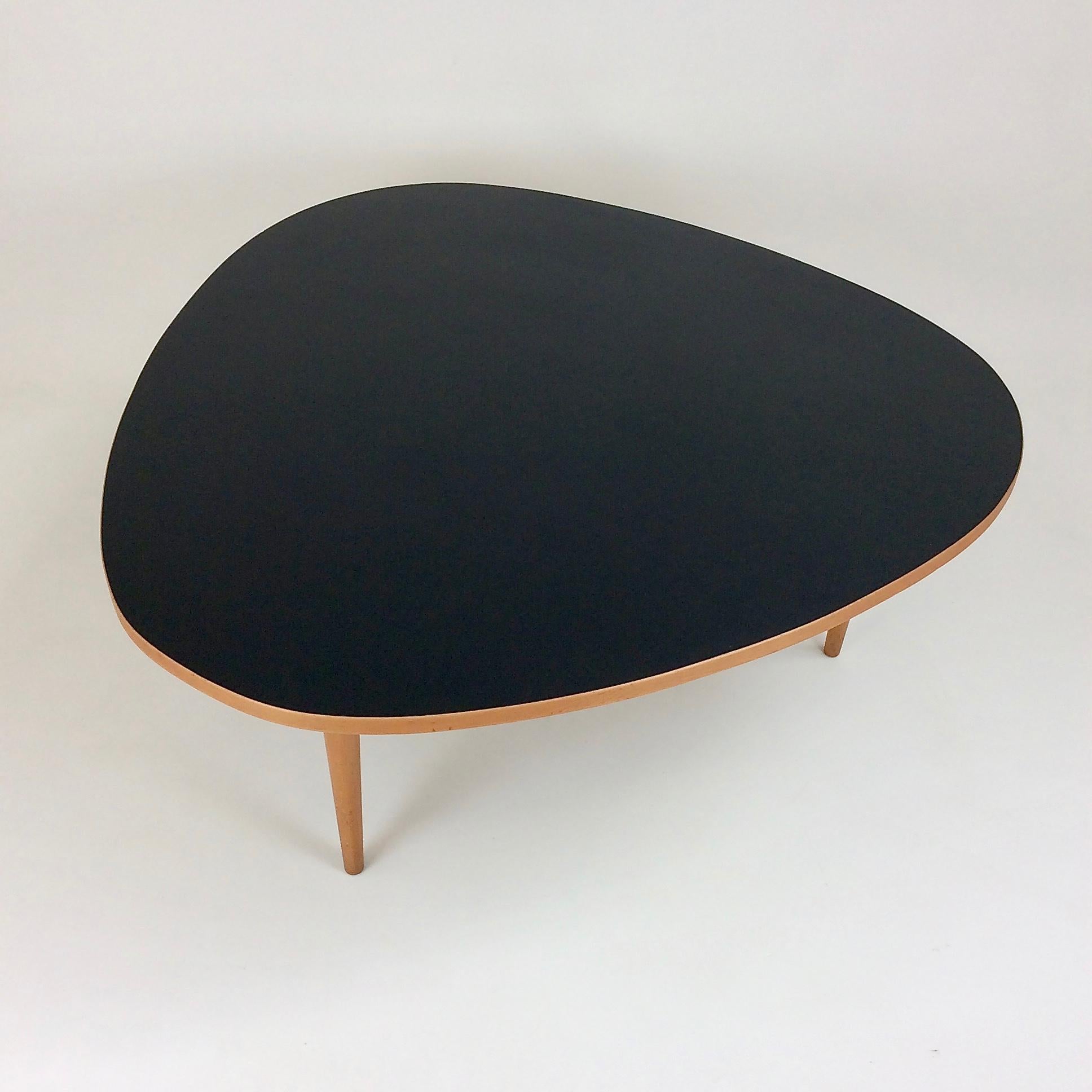 Max Bill three circles coffee table for Wohnbedarf, circa 1950, Switzerland.
Mable wood and black linoleum.
Dimensions: 110 cm W, 110 cm D, 46 cm H.
Original condition.
All purchases are covered by our Buyer Protection Guarantee.
 
 
  