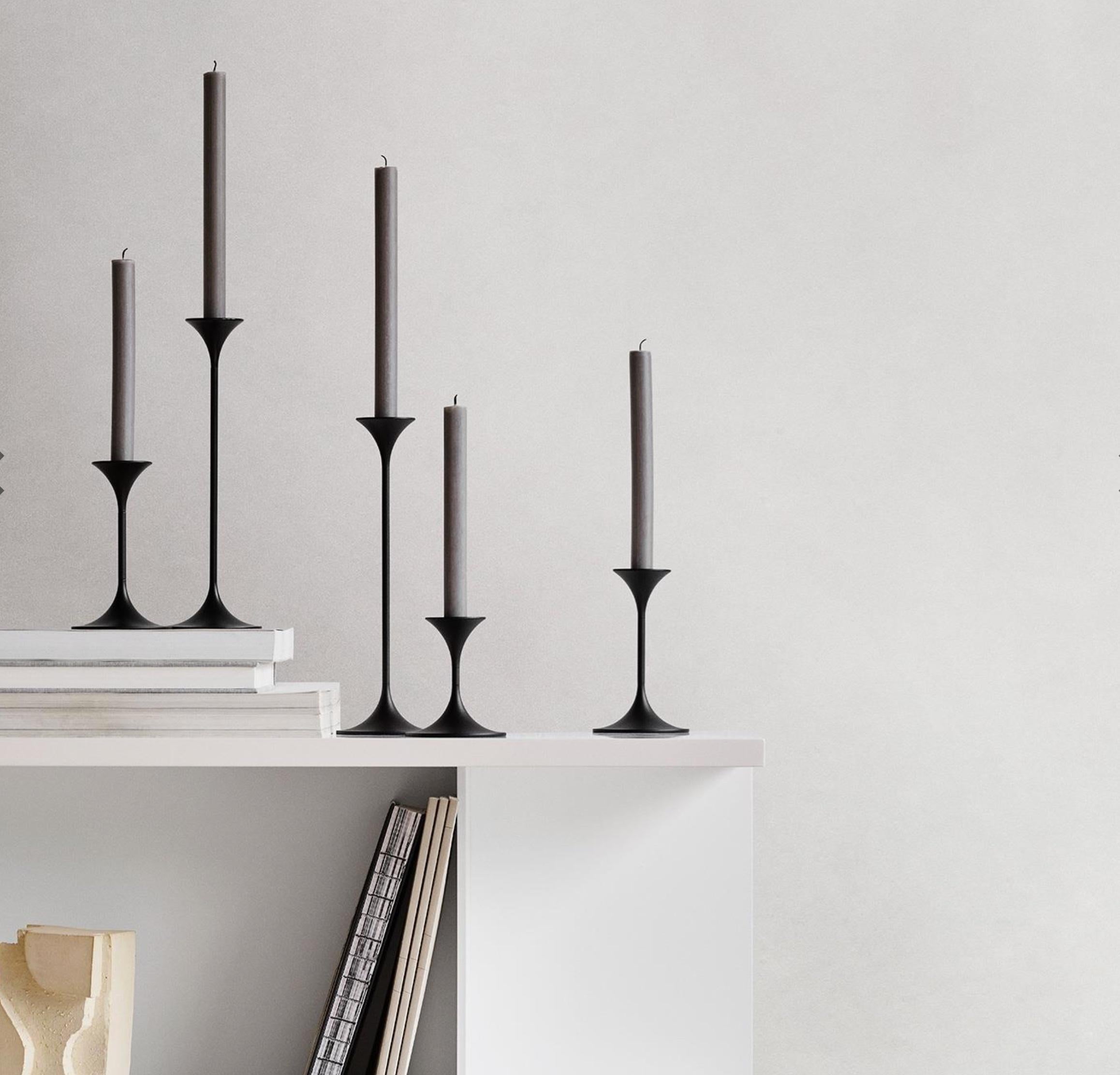 Elegant and with a hint of whimsy, the modular candleholder Jazz was conceived in 1961 by Danish architect, ceramist and jazz musician Max Brüel. A slender, graceful silhouette in three heights, Jazz is an elegant addition to the home – by itself or