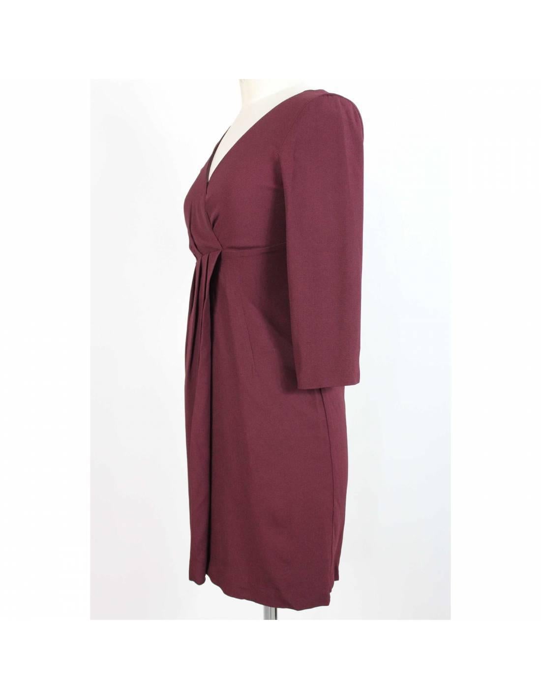 Vintage Max & Co woman dress, burgundy color, viscose, sheath dress, V-neckline, 3/4 sleeves. 90s. Made in Italy. Excellent vintage condiments.

Size: 40 It 6 Us 8 Uk

Shoulder: 40 cm

Bust / Chest: 41 cm

Sleeve: 42 cm

Length: 90 cm