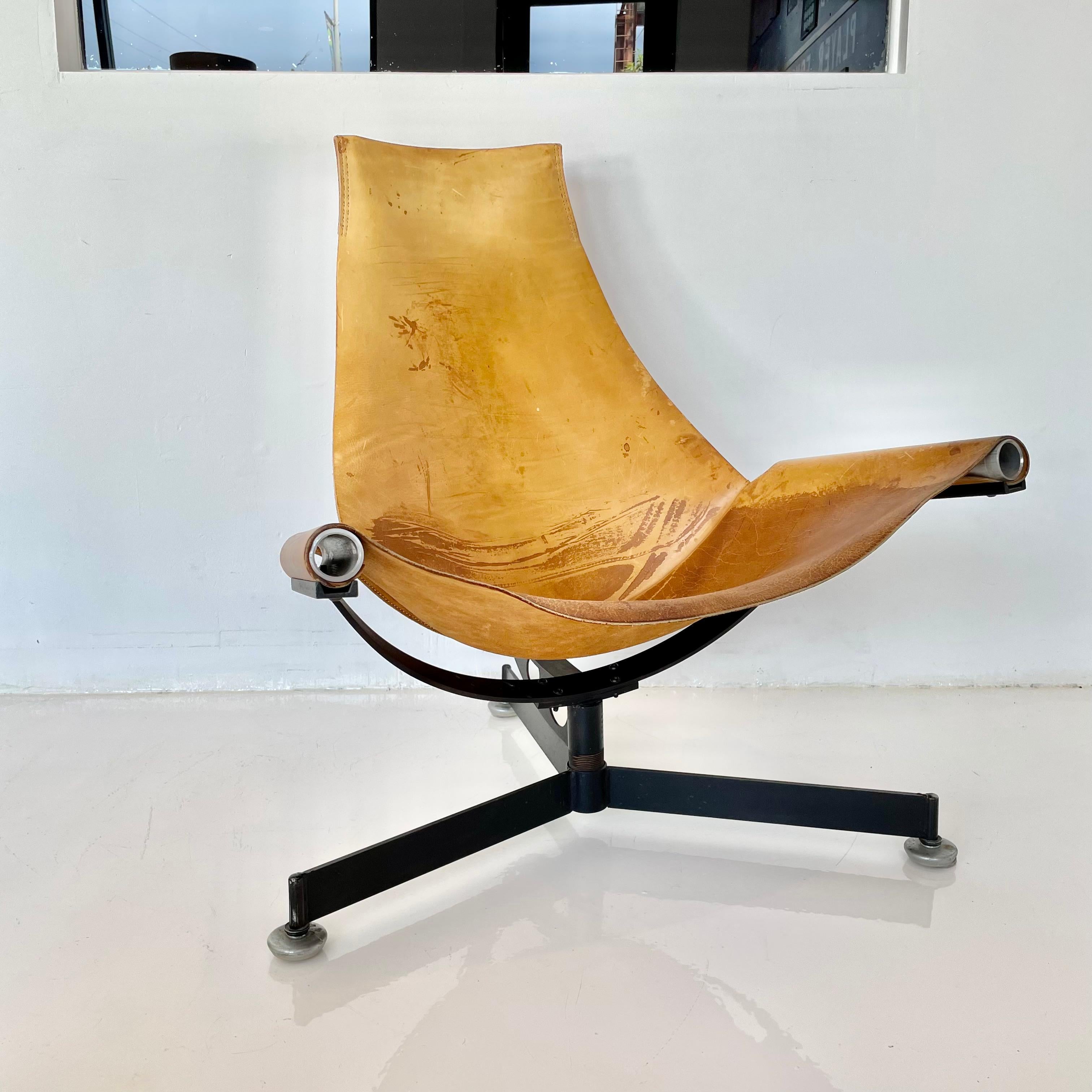 Sculptural iron and leather chair by Arizona native and industrial designer Max Gottschalk. Known for well proportioned work in natural materials with purposeful imperfections. Designed and created in the 1960s, the iron sling chair is his most