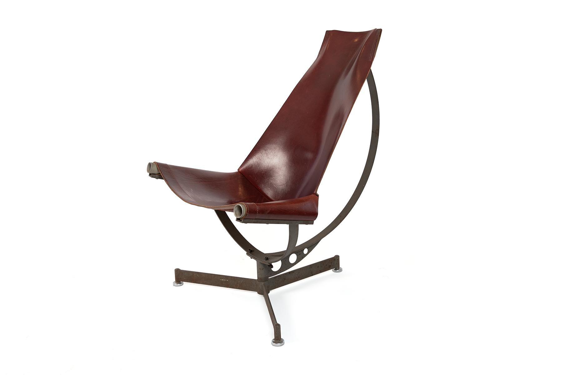 Pair of striking iron sling chairs in ox blood saddle leather by Arizona designer Max Gottschalk. Price listed is for the pair.