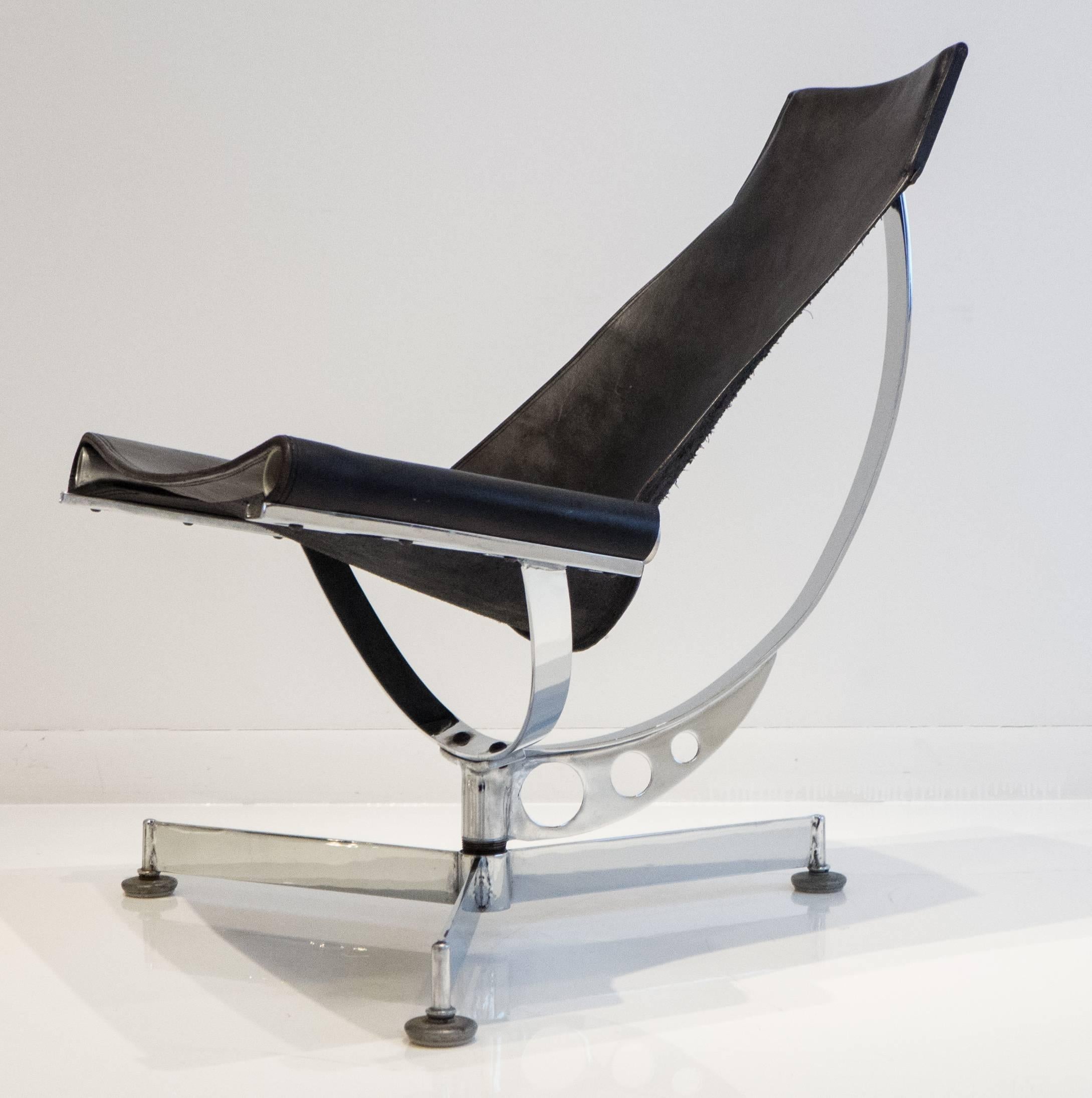 Futuristic-looking sling chair with swooping compound spherical base. By Max Gottschalk, circa 1970s. Uncommon chrome-plated base. The black leather sling has been recently reupholstered.