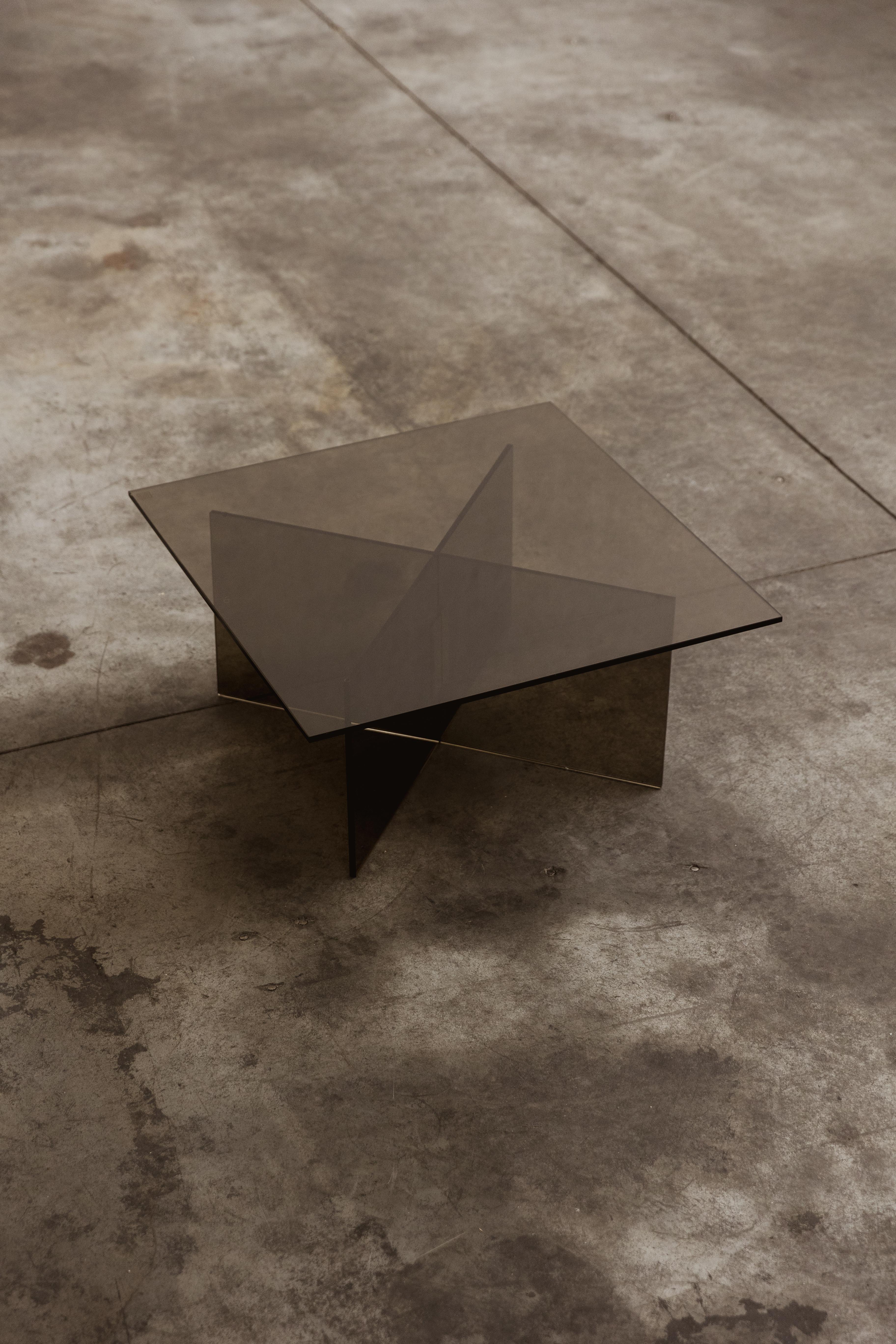 Max Ingrand “2012” coffee table for Fontana Arte, smoked glass, Italy, 1960.

The 